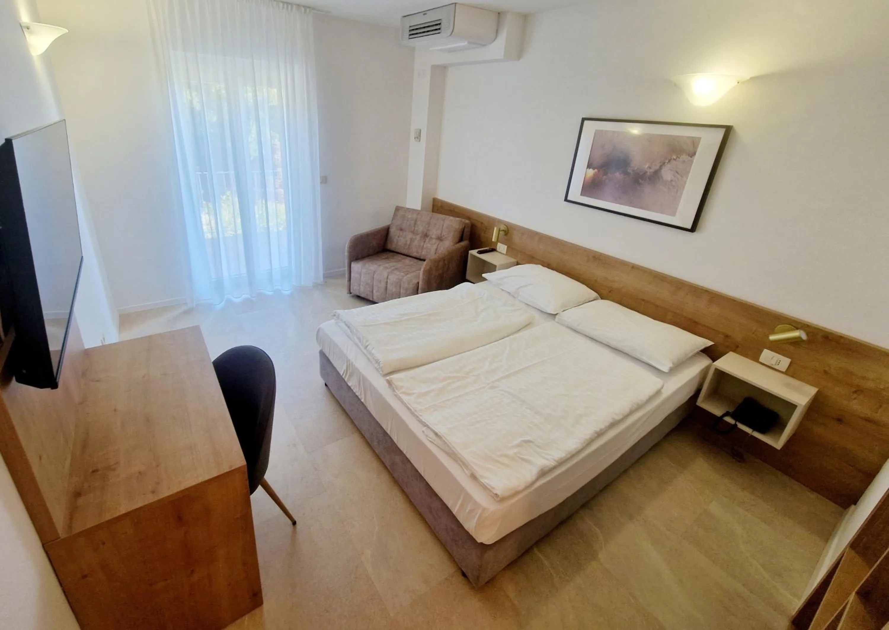 Bed in Belvedere Resort Hotels