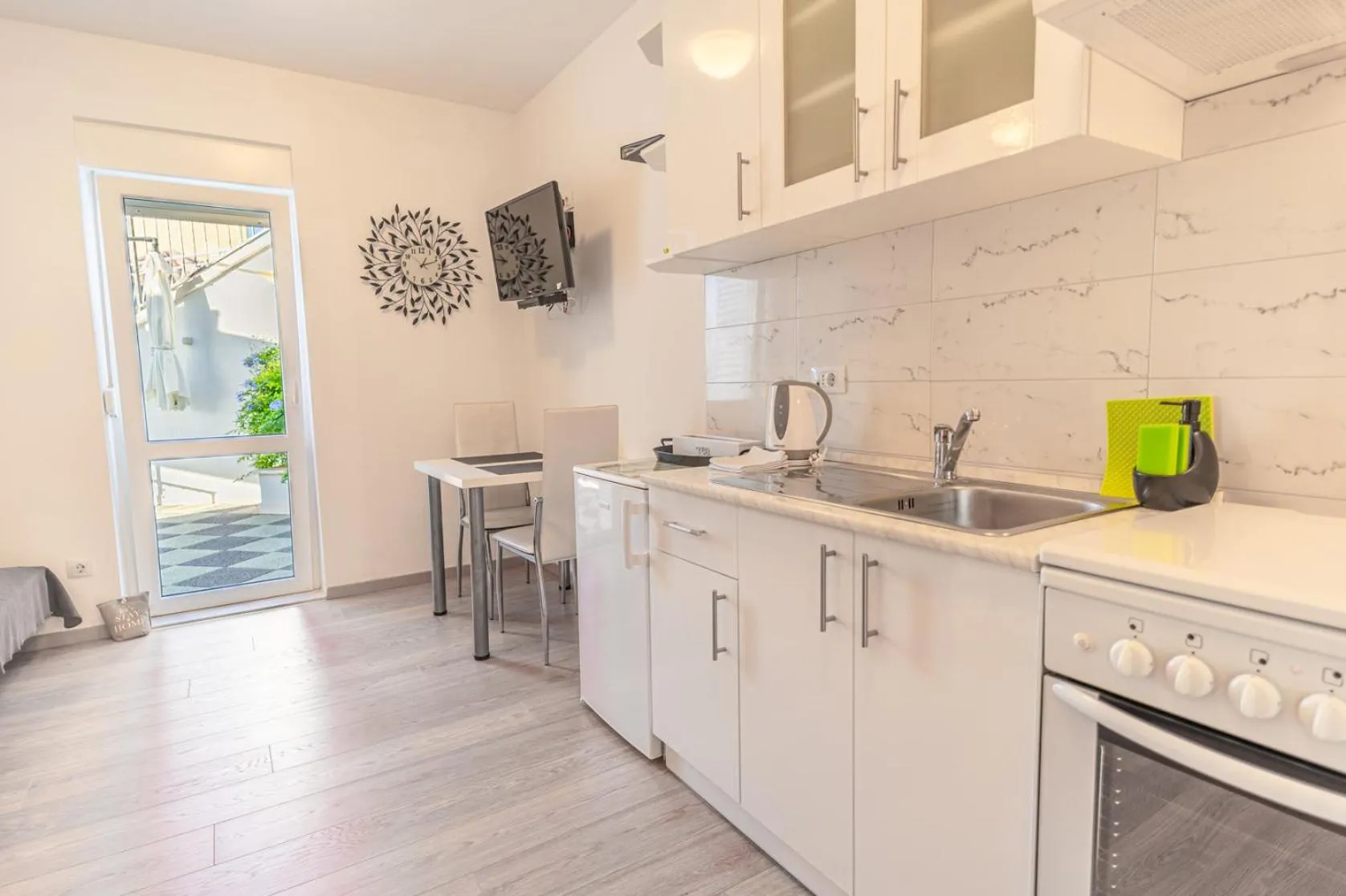 Kitchen or kitchenette in Apartments Didan