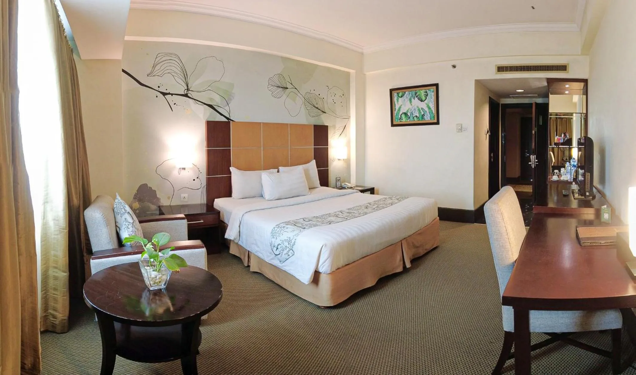 Bed in Emerald Garden International Hotel