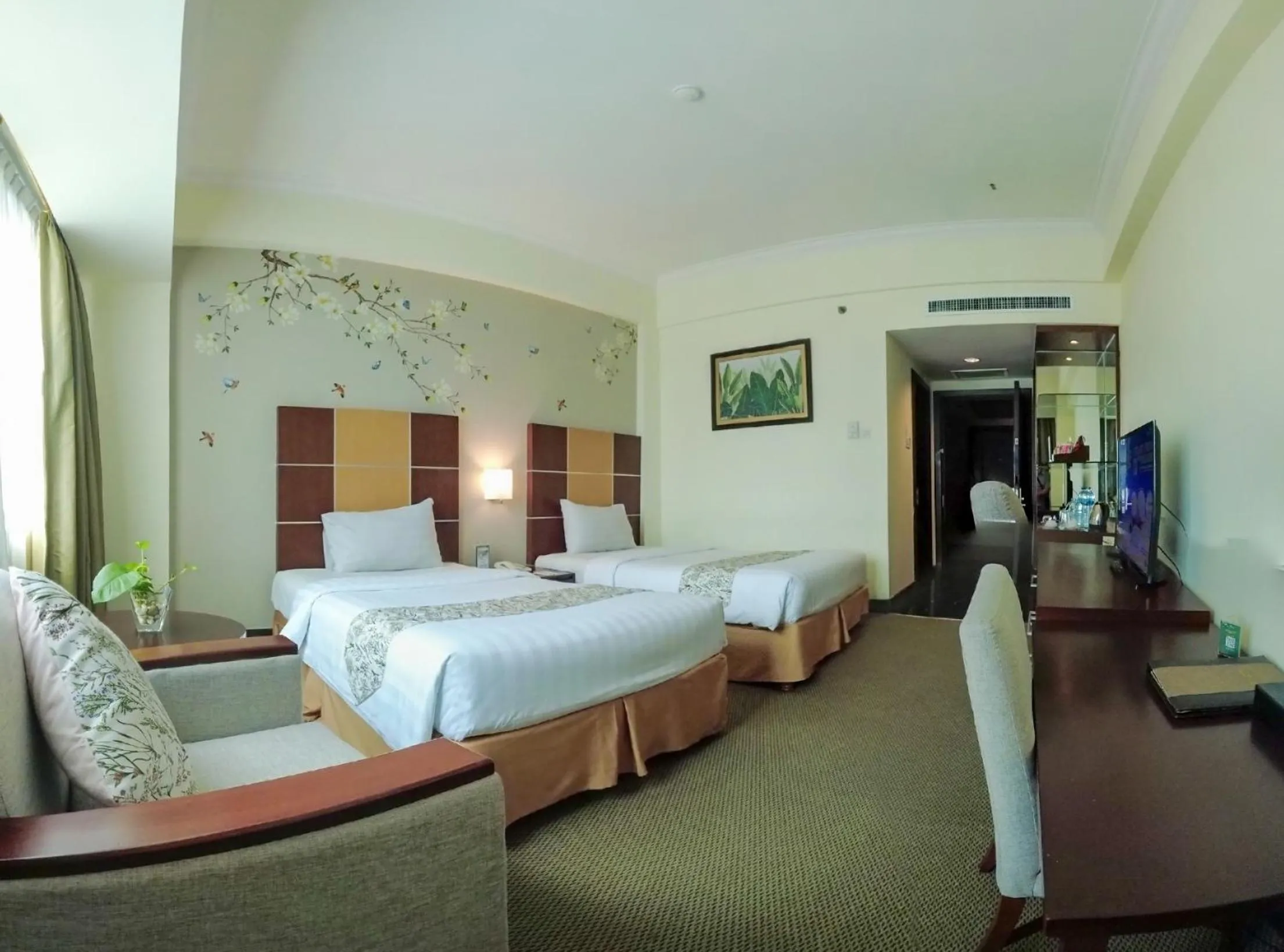 Bed in Emerald Garden International Hotel