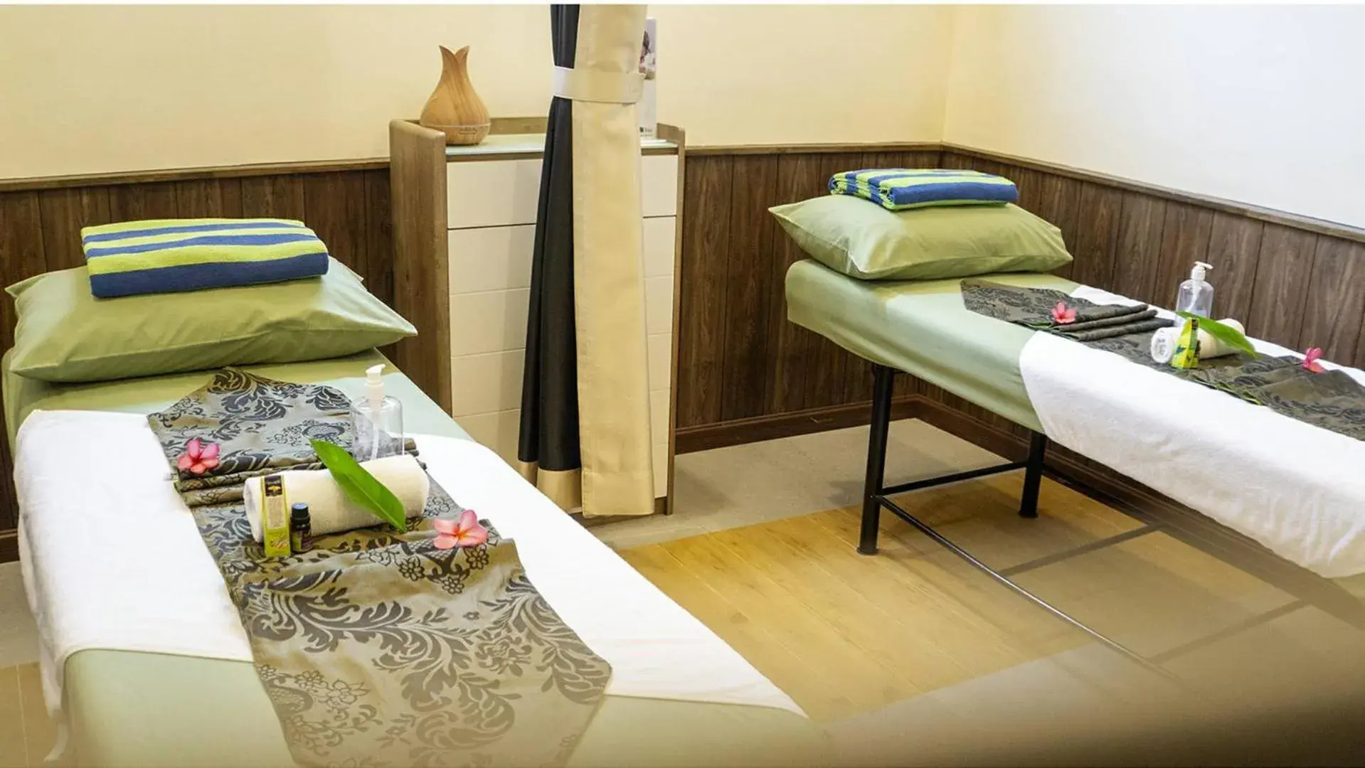 Bed in Emerald Garden International Hotel Bed in Emerald Garden International Hotel