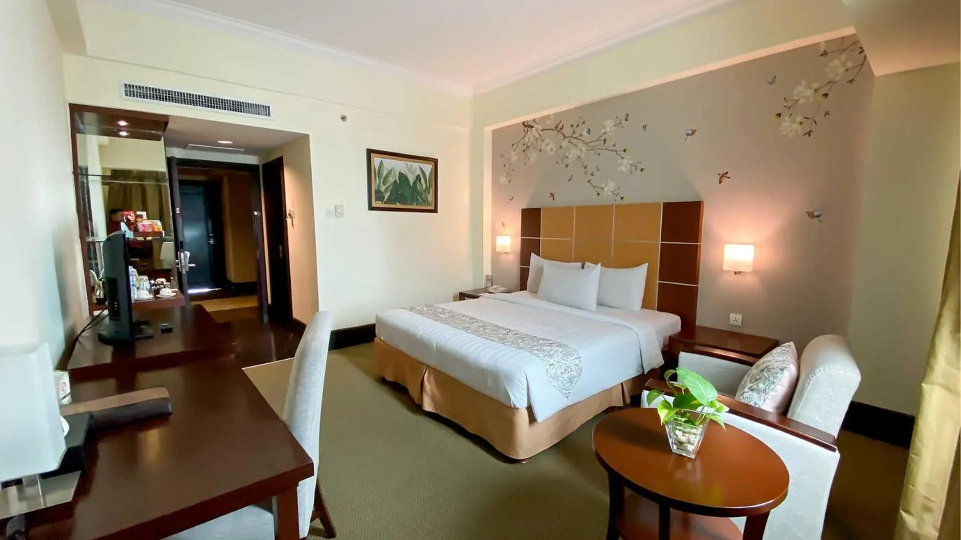 Bed in Emerald Garden International Hotel