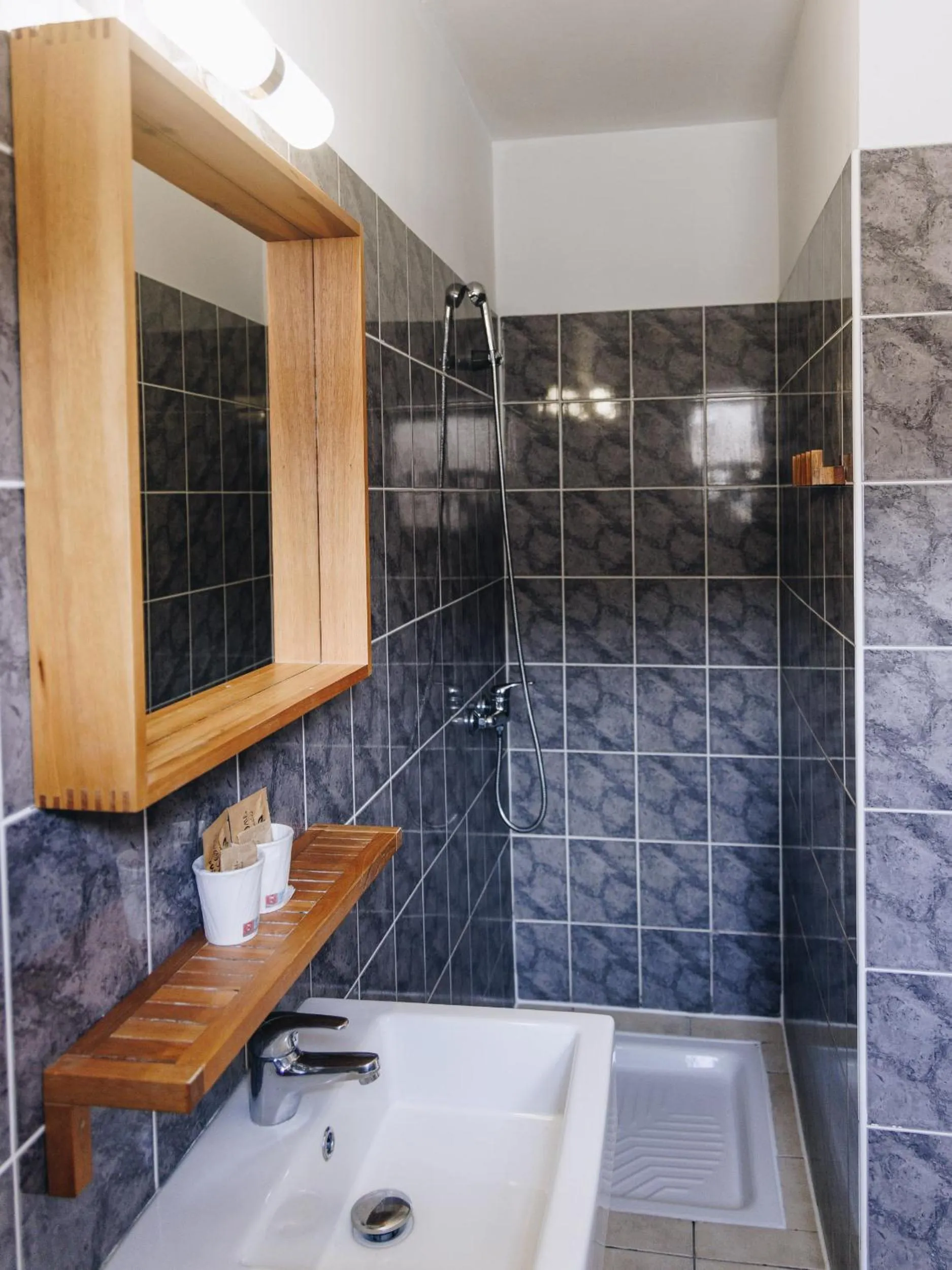 Bathroom in Hôtel et Résidence Benista