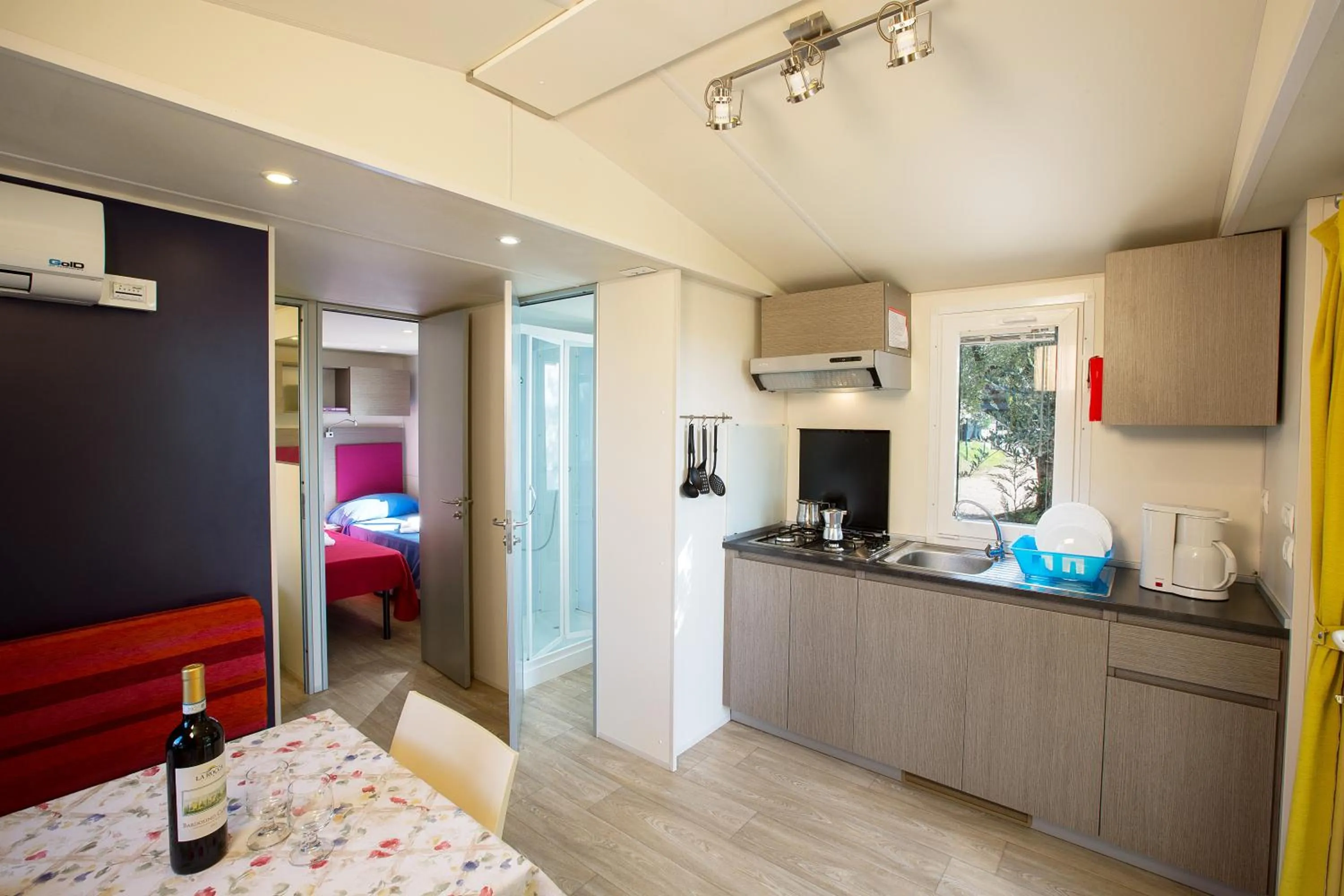 Dining area, Bed in La Rocca Camping Village