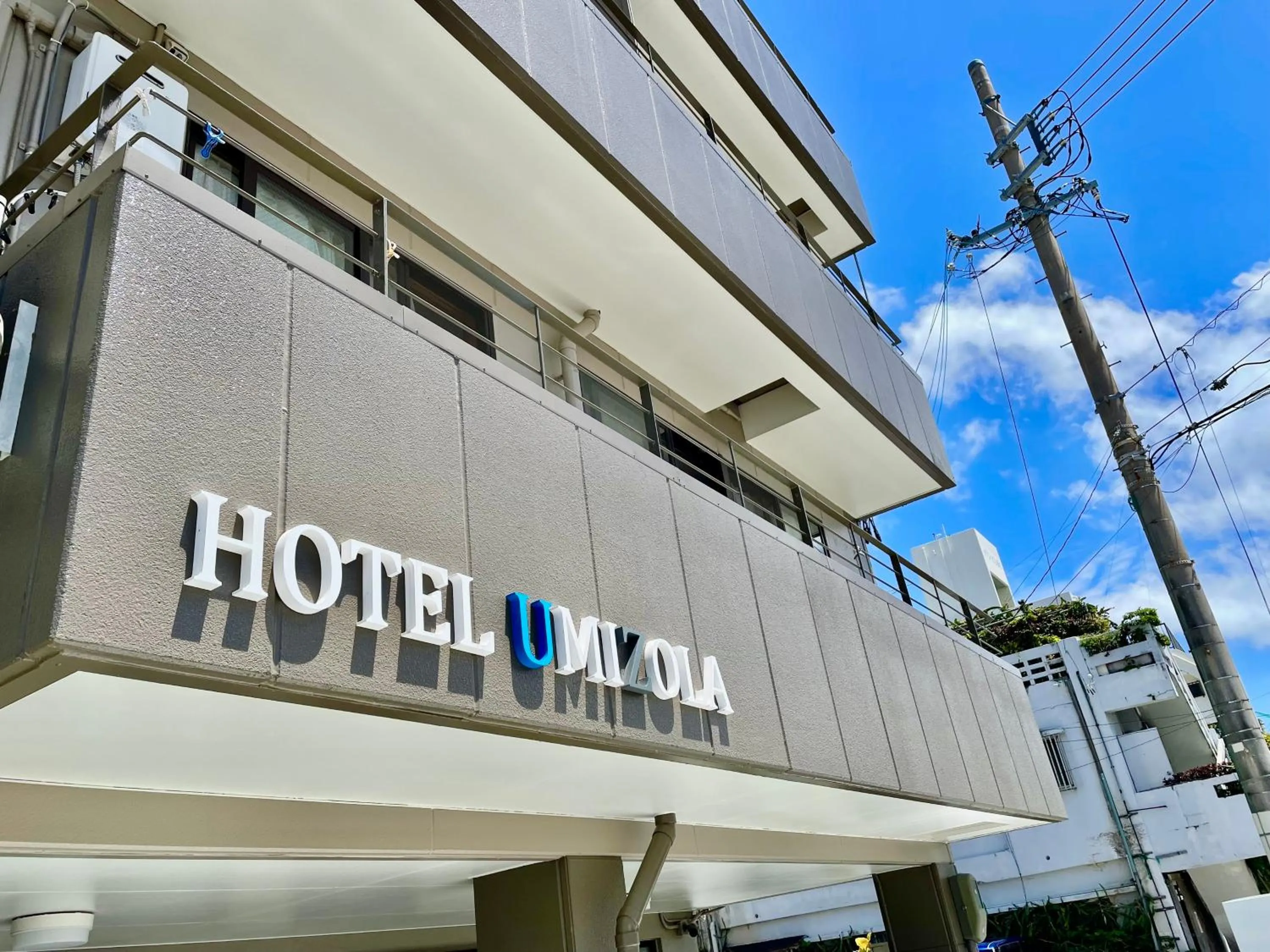 Property logo or sign in Hotel Umizola