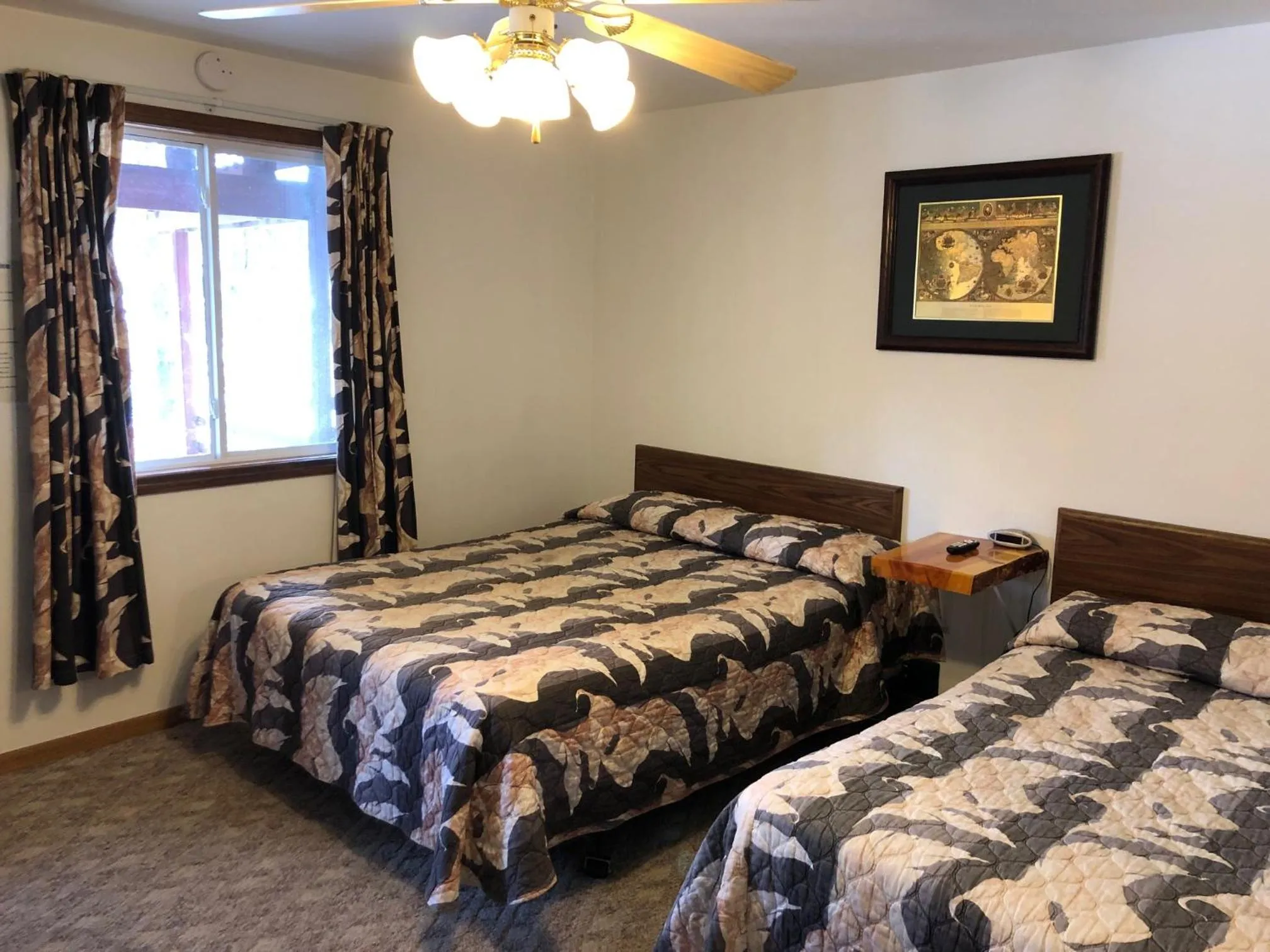 Bed in Black Hills Cabins at Quail's Crossing