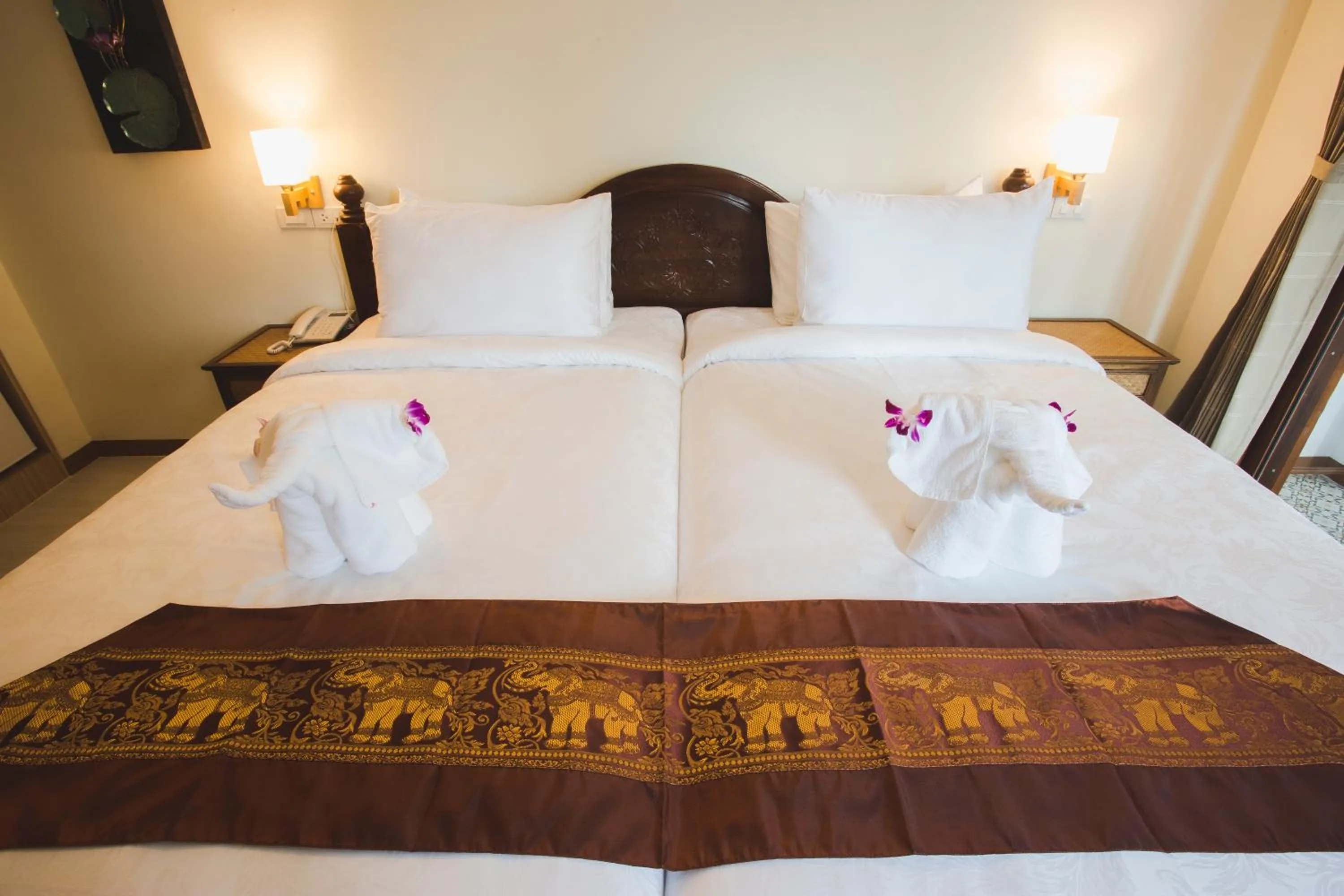 Bed in Chada Mantra Hotel