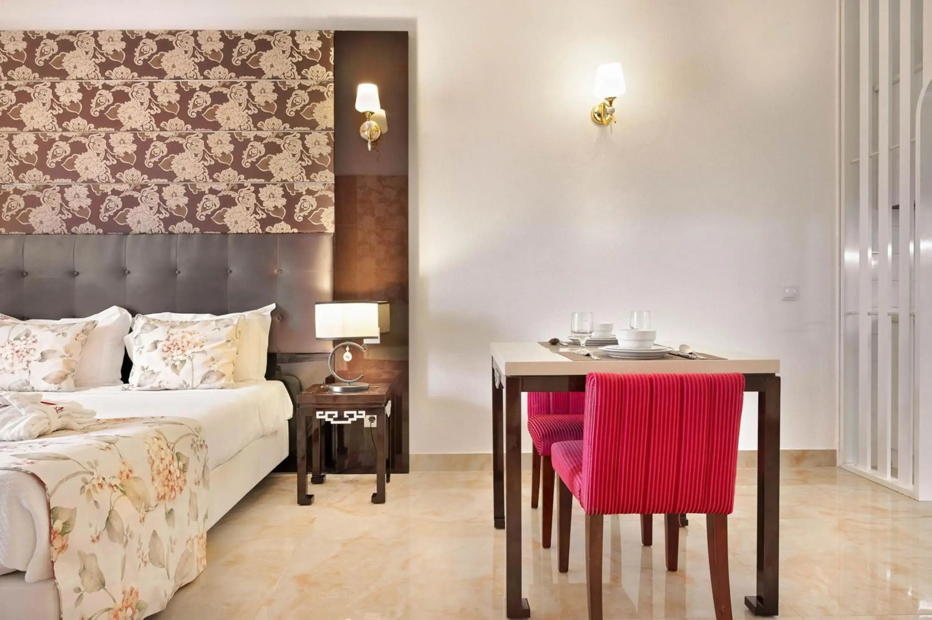 Dining area, Bed in Grand Muthu Oura View Beach Club Dining area, Bed in Grand Muthu Oura View Beach Club