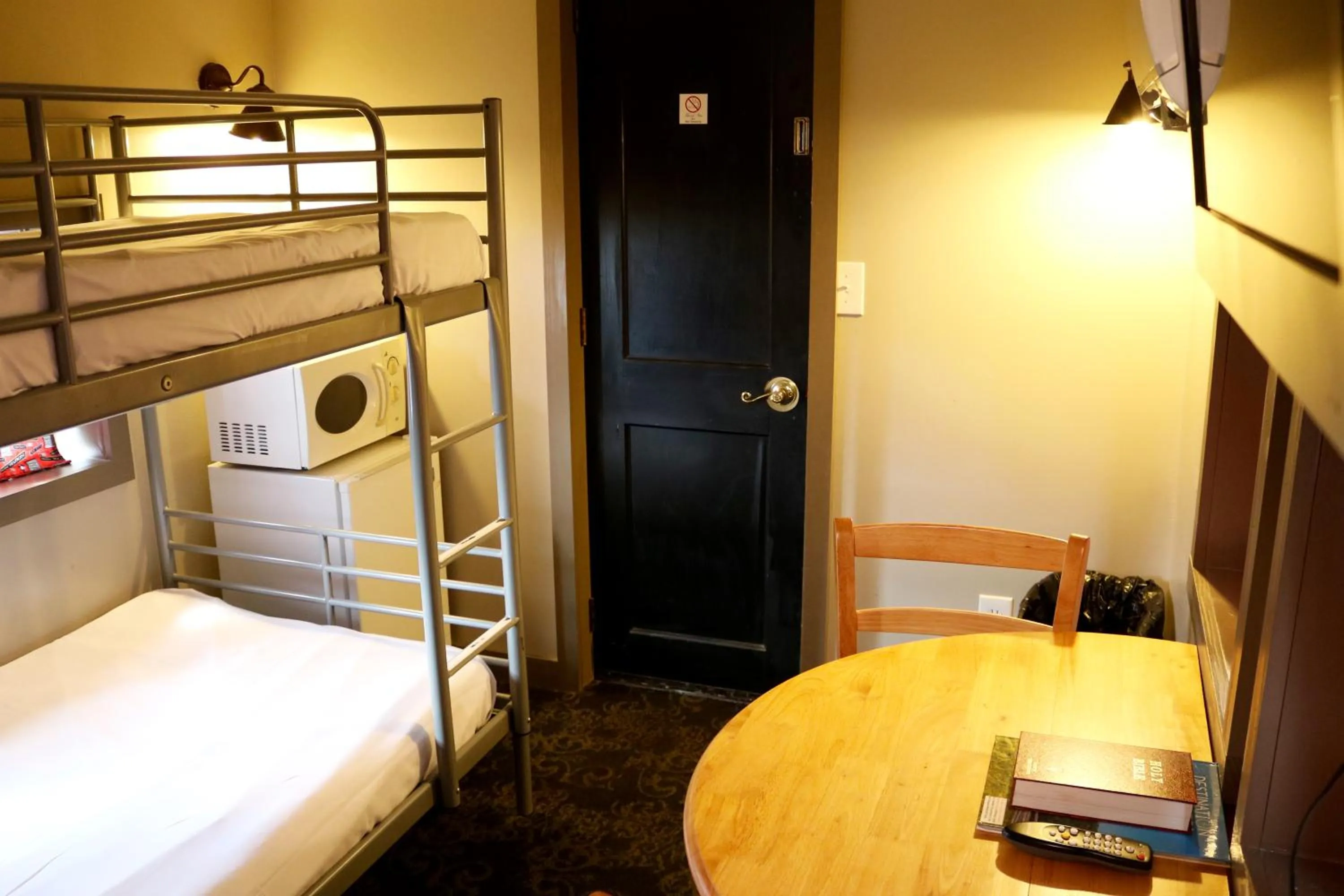 Bed in Red Caboose Motel & Restaurant