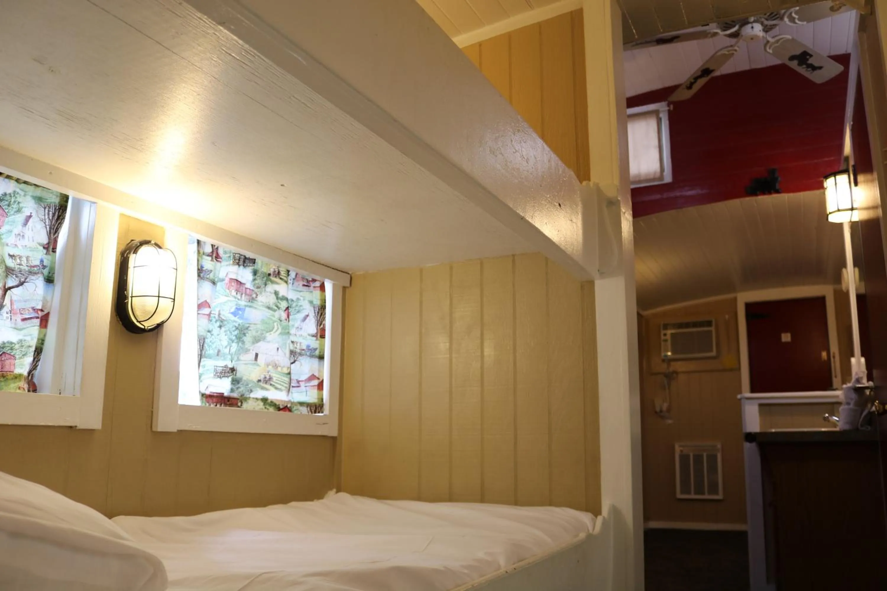 Bed in Red Caboose Motel & Restaurant