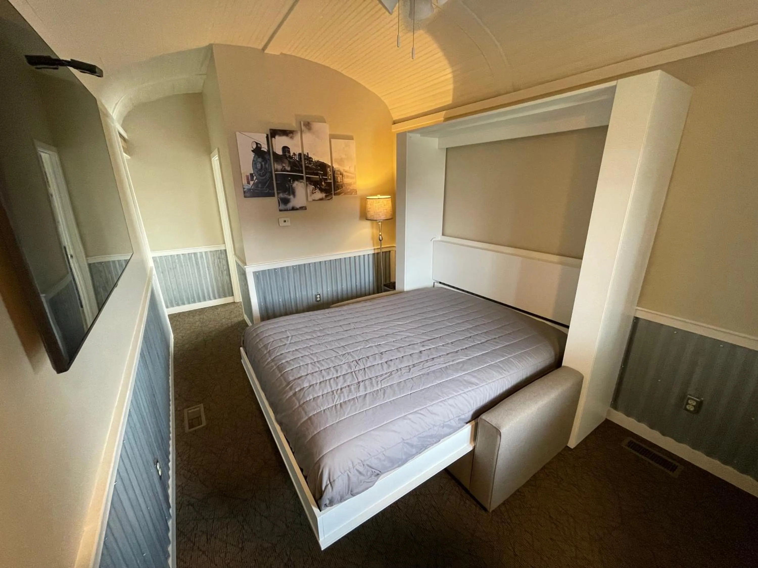 Bed in Red Caboose Motel & Restaurant