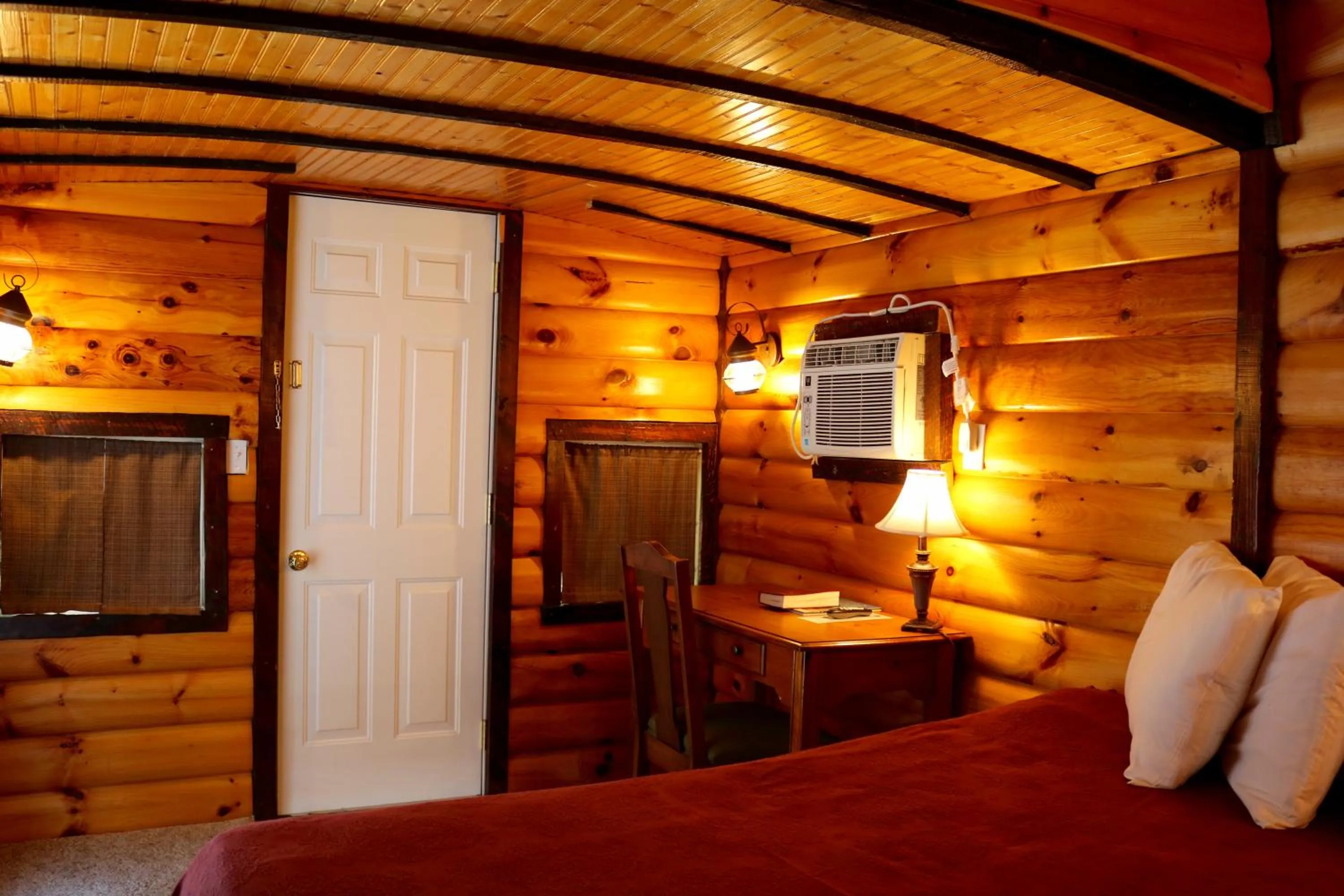 Bed in Red Caboose Motel & Restaurant