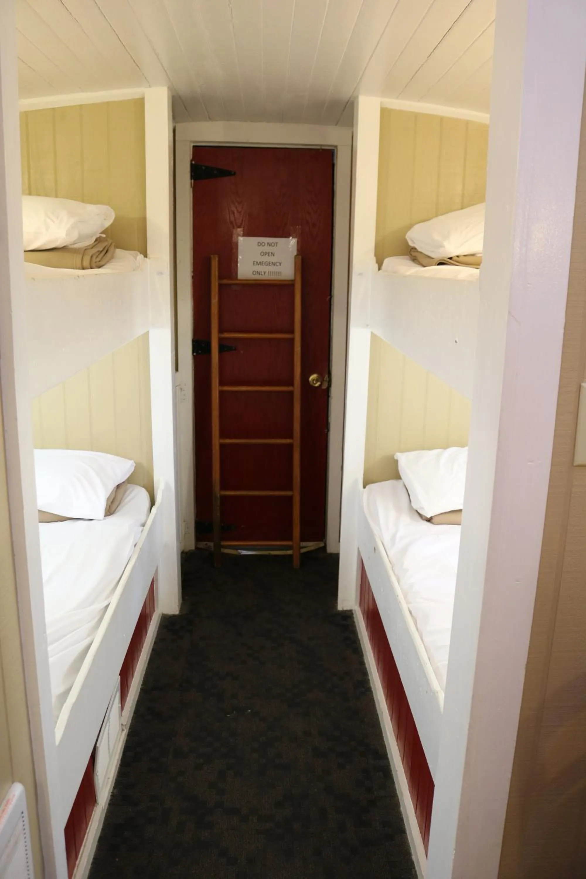 Bed in Red Caboose Motel & Restaurant