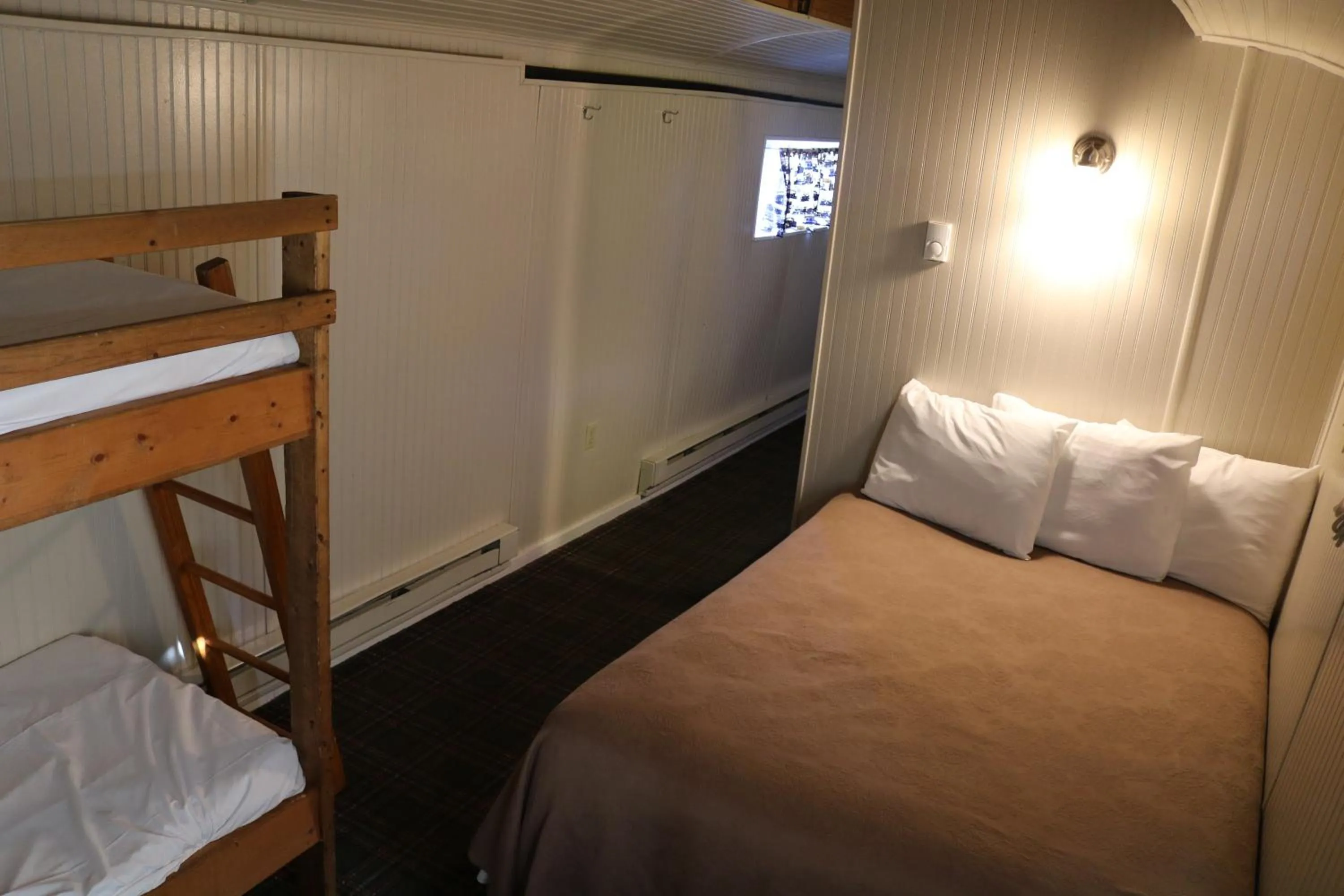 Bed in Red Caboose Motel & Restaurant