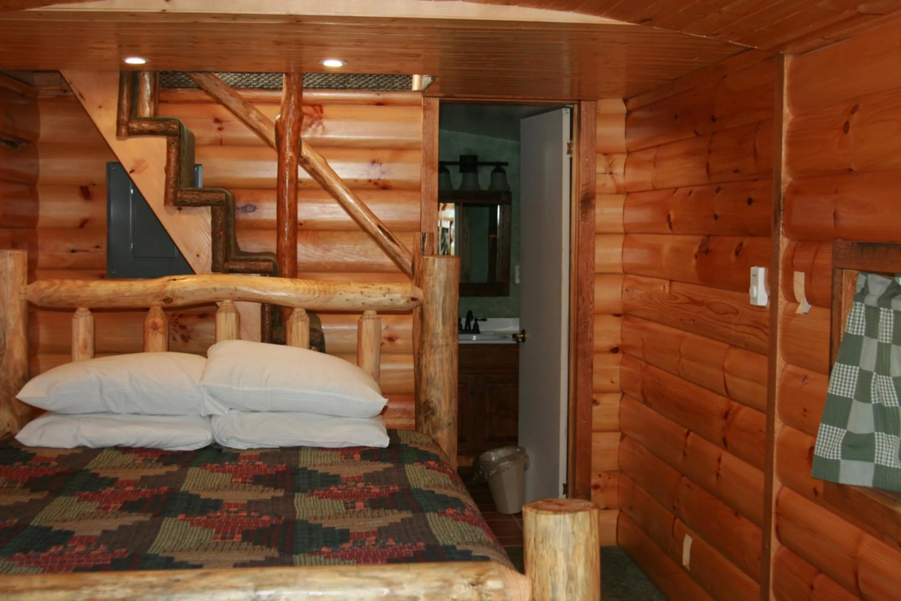 Bed in Red Caboose Motel & Restaurant