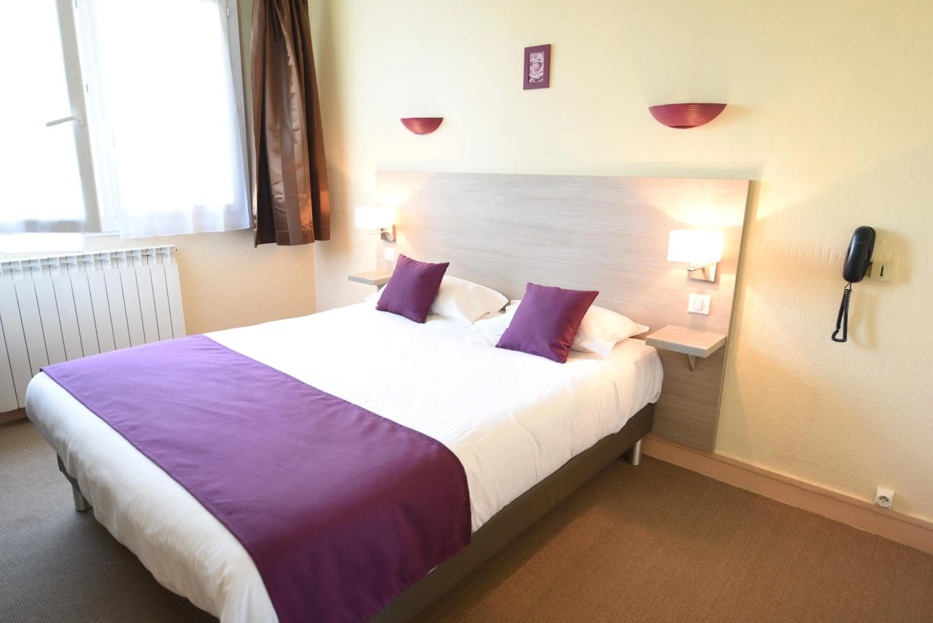 Bed in Hôtel Continental