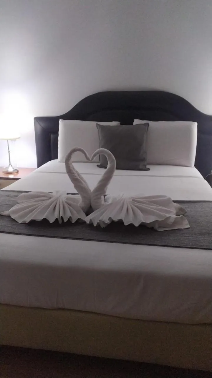 Bed in Hotel Excelsior