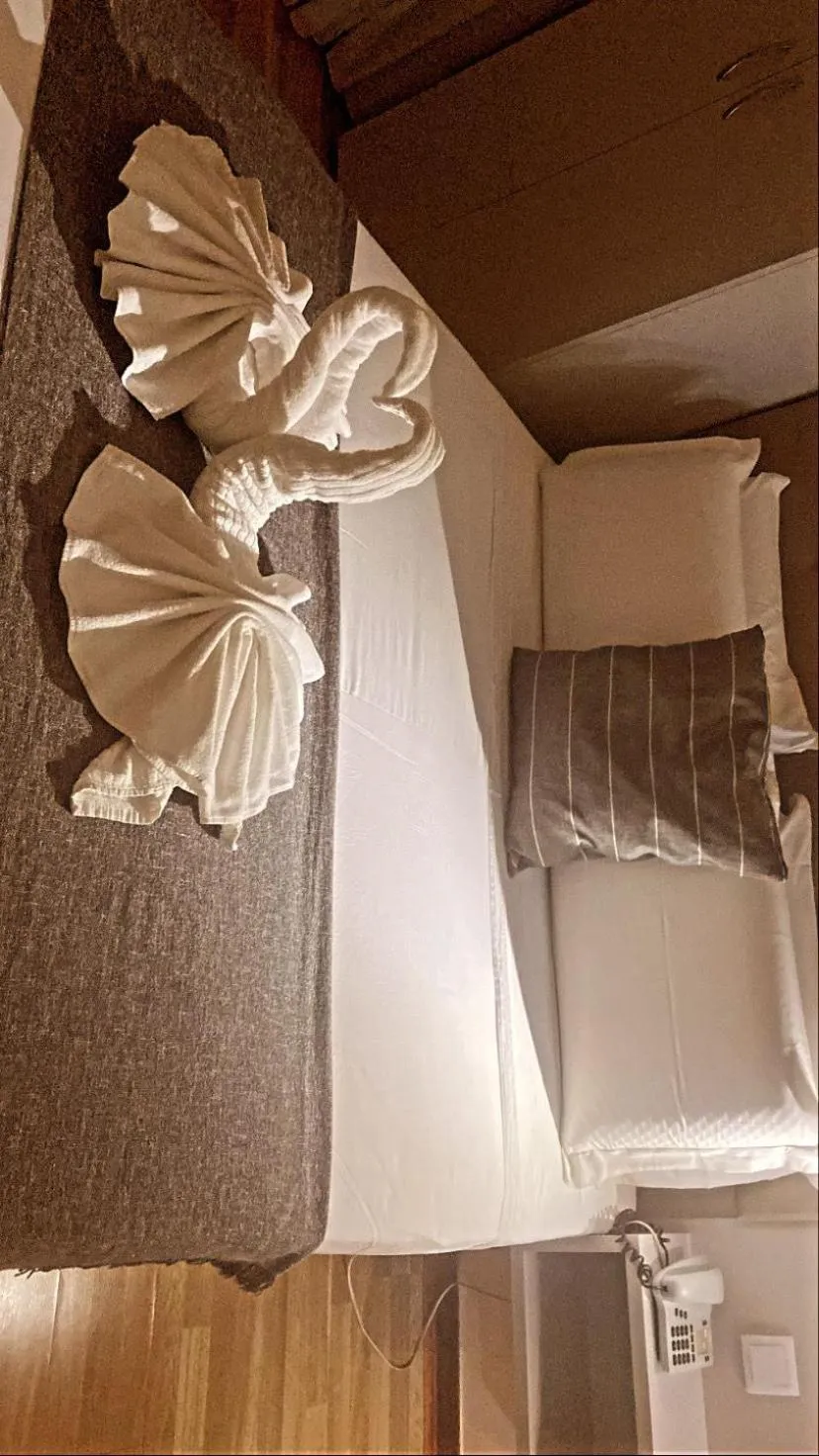 Bed in Hotel Excelsior