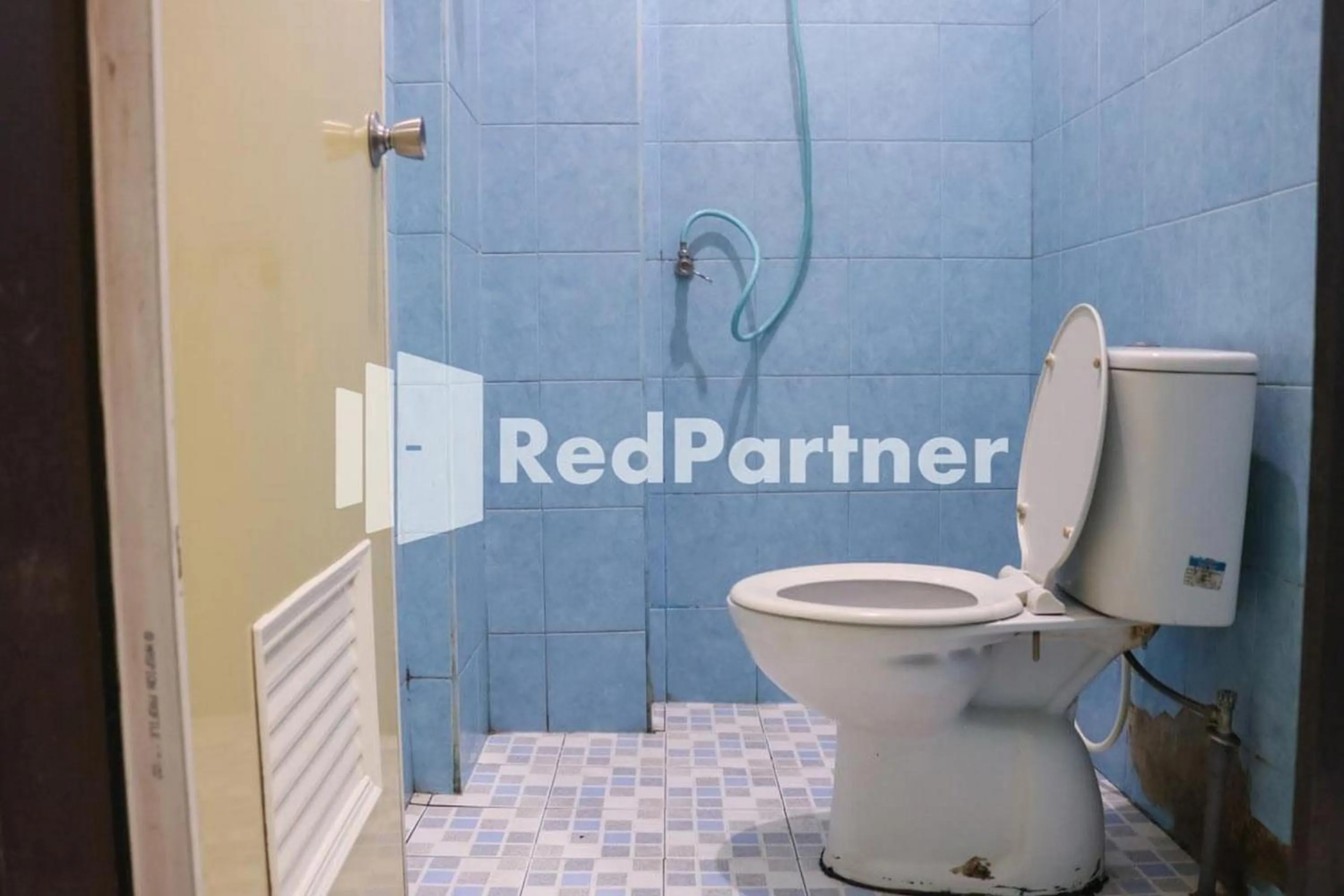 Bathroom in Good Sleep Balikpapan Mitra RedDoorz
