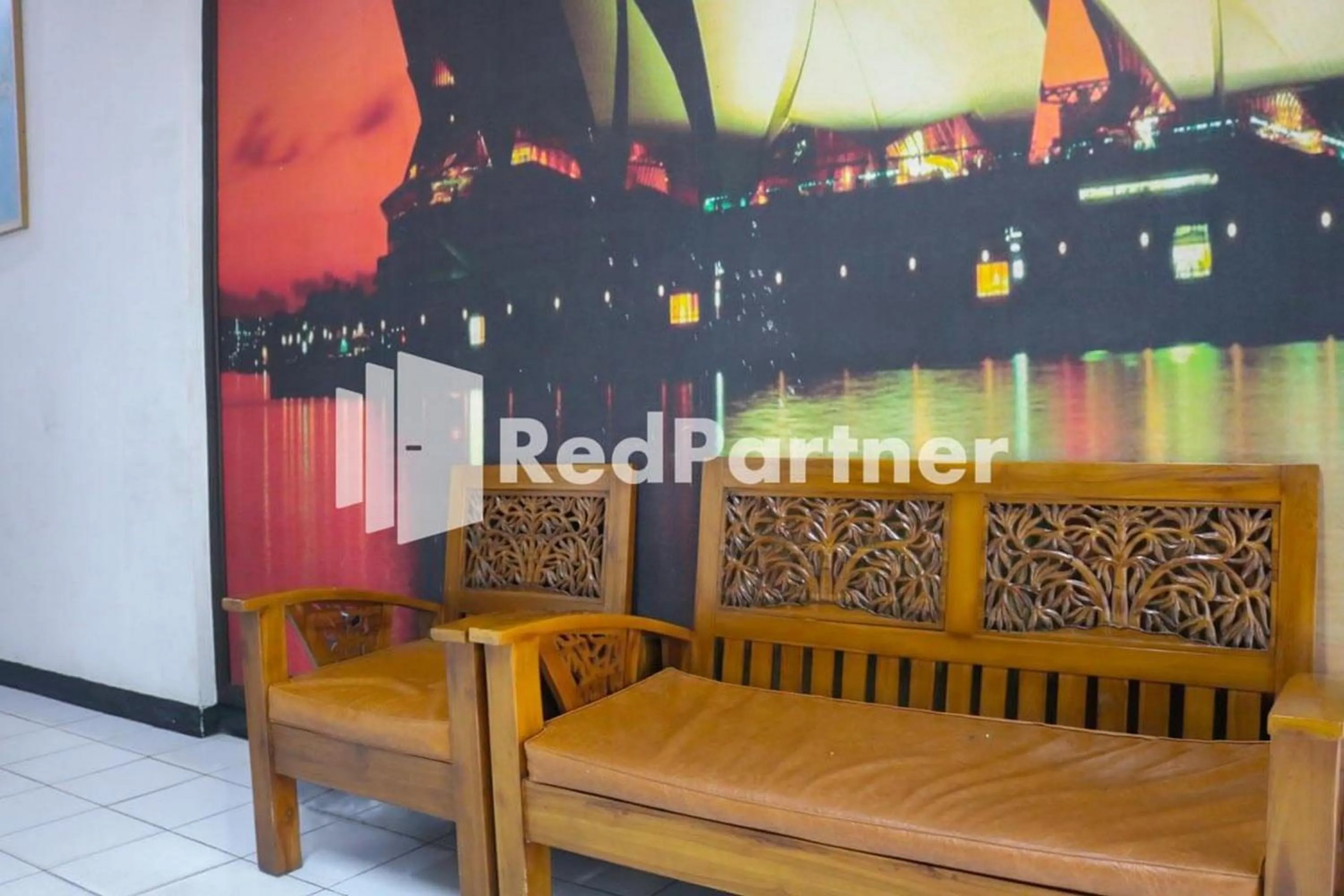 Seating area in Good Sleep Balikpapan Mitra RedDoorz