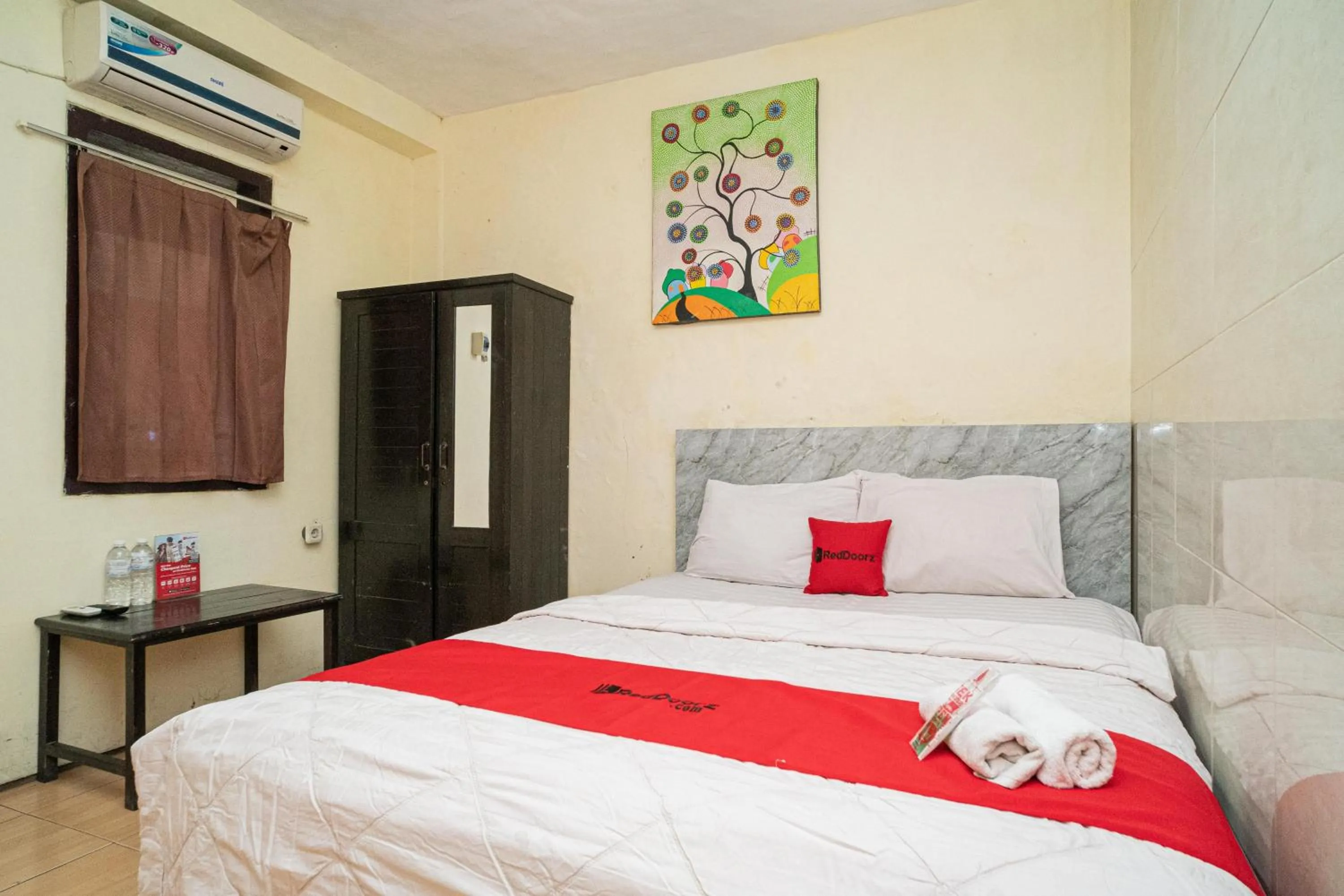 Bed in RedDoorz near Cyber Mall