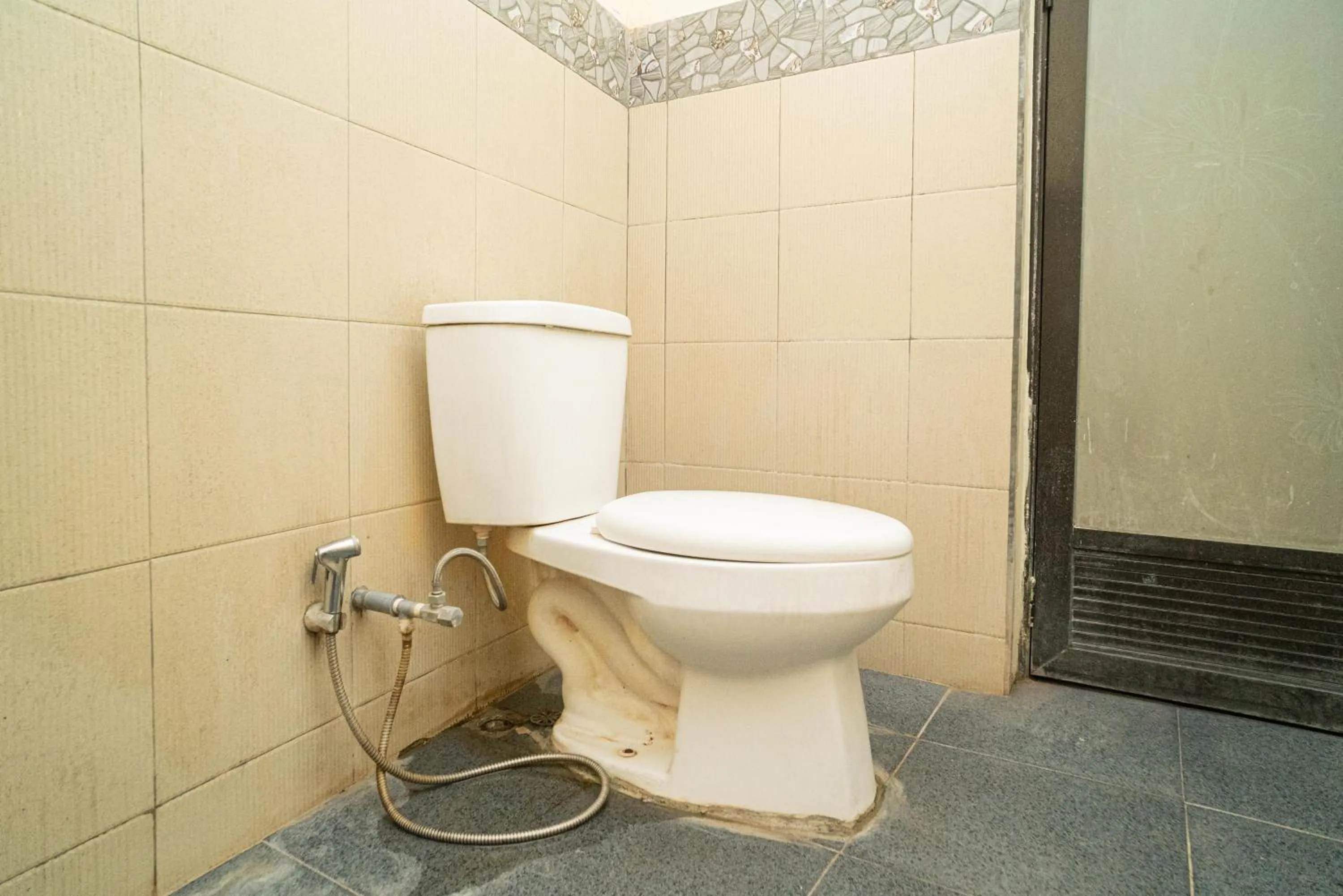 Bathroom in RedDoorz near Cyber Mall