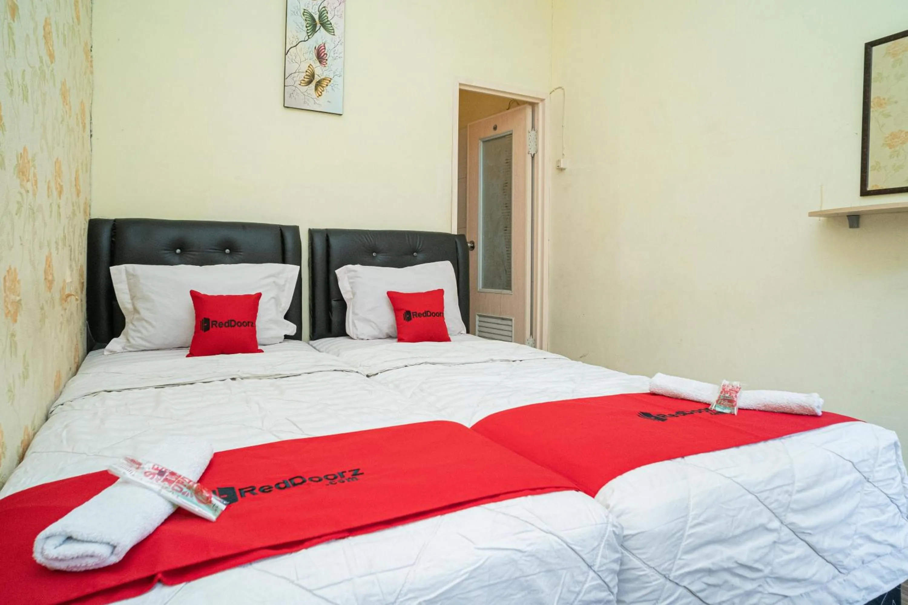 Bed in RedDoorz near Cyber Mall