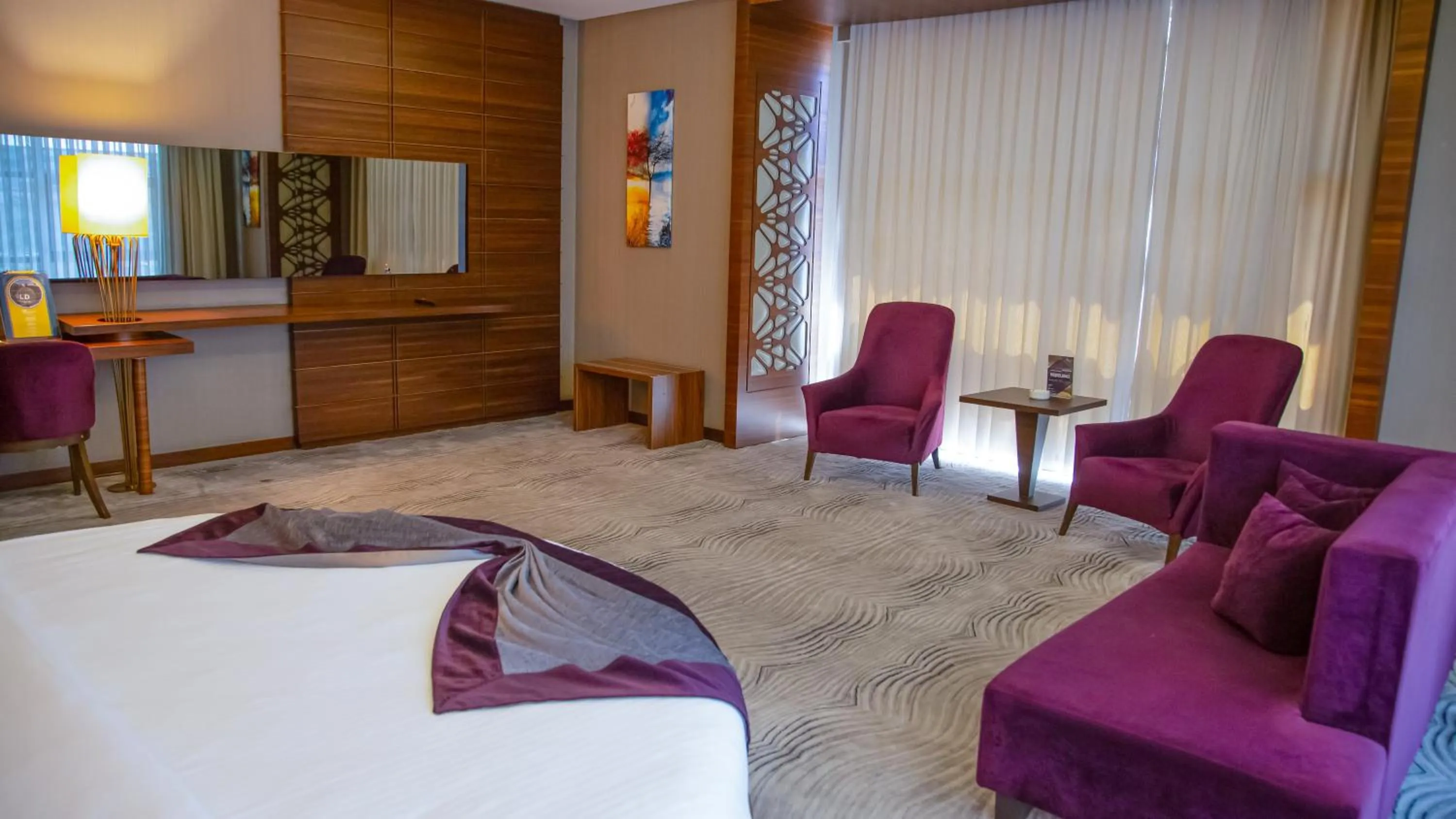 Living room, Bed in Gold Majesty Hotel