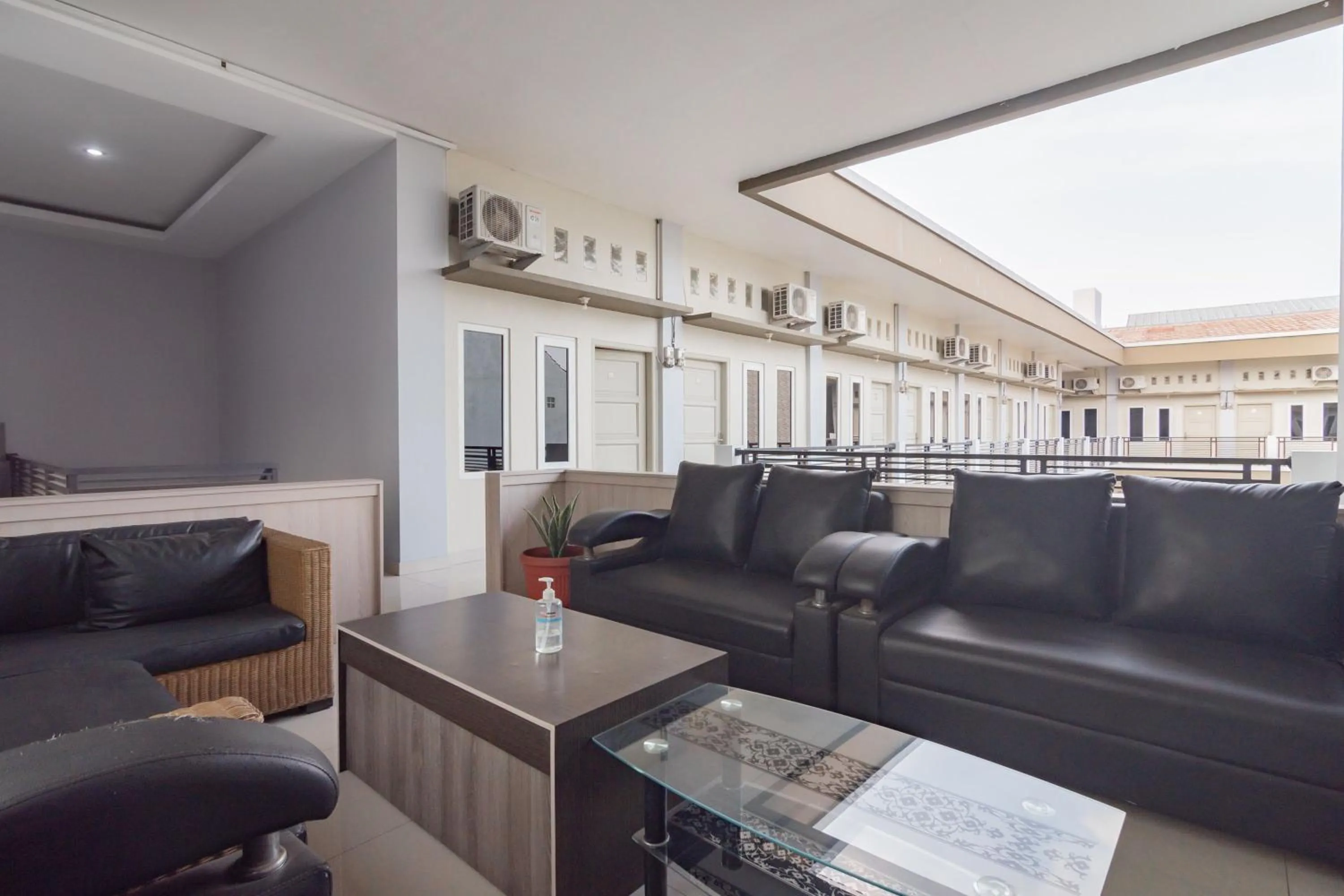 Living room in RedDoorz Plus Syariah @ Tuparev Cirebon 3