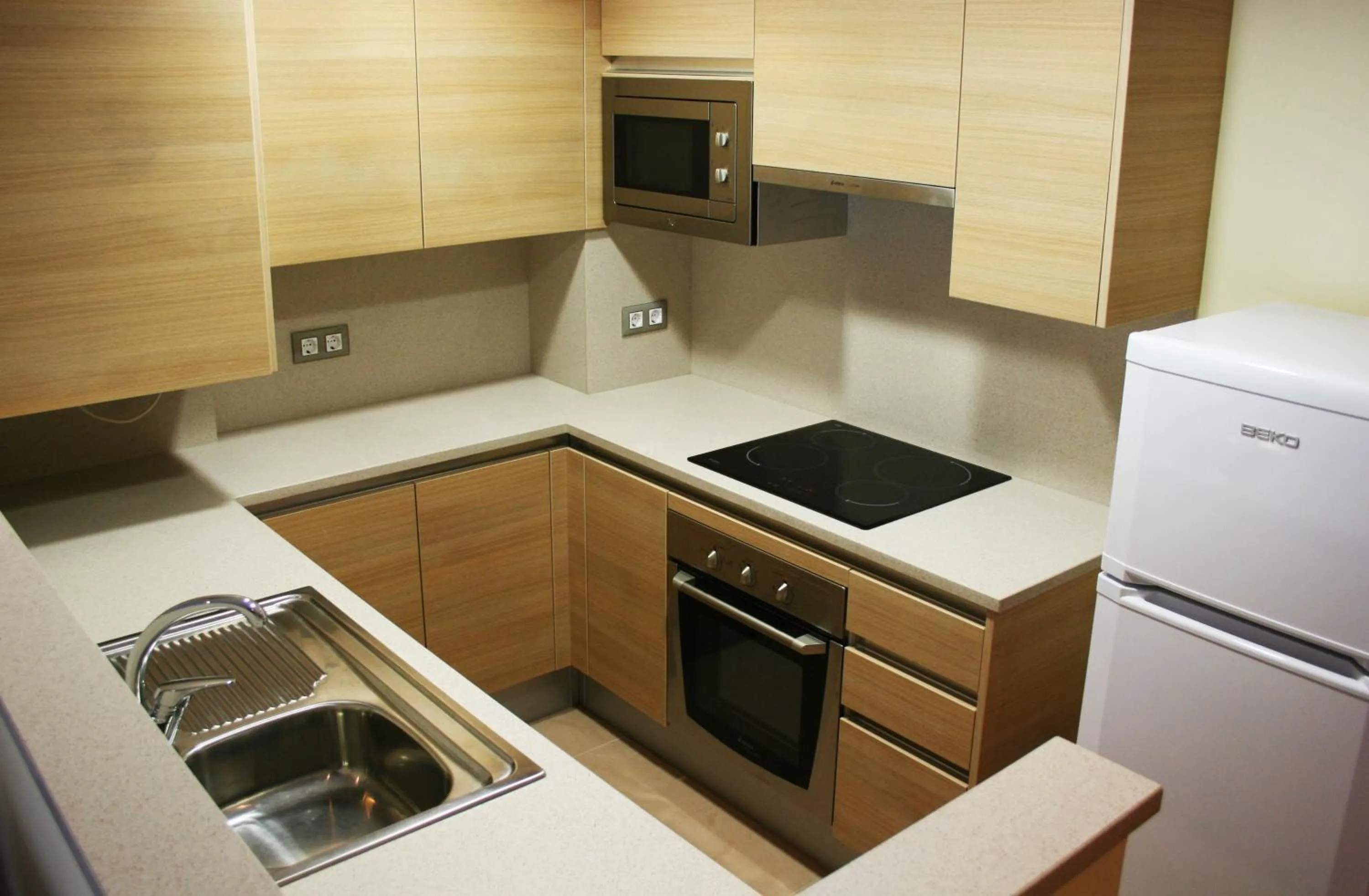 Kitchen or kitchenette in Palamós Apartamentos
