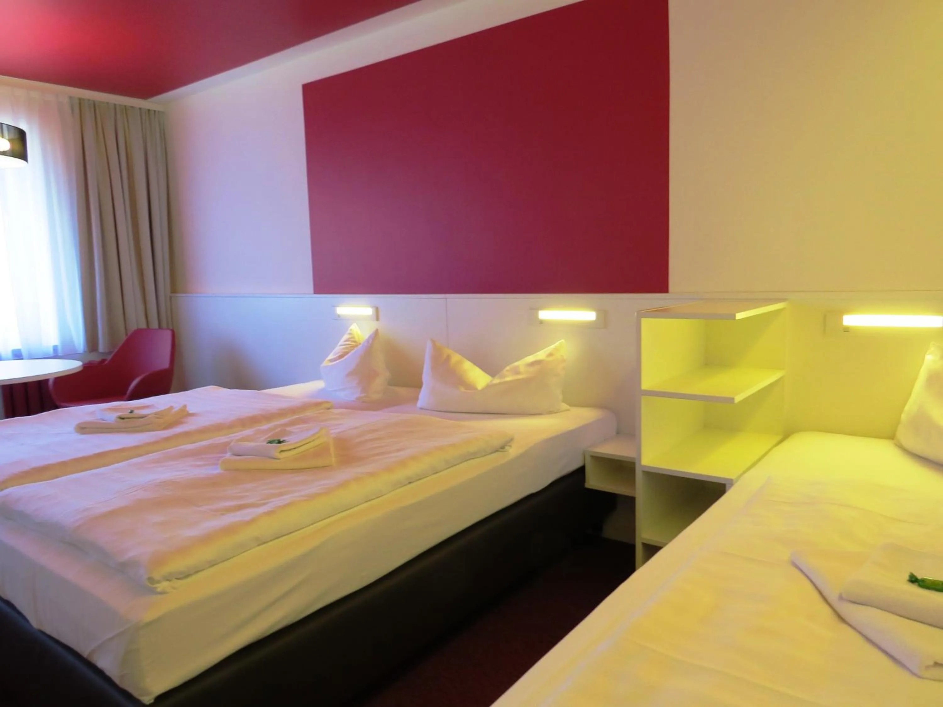 Photo of the whole room, Bed in KA&KA Hotel Garni