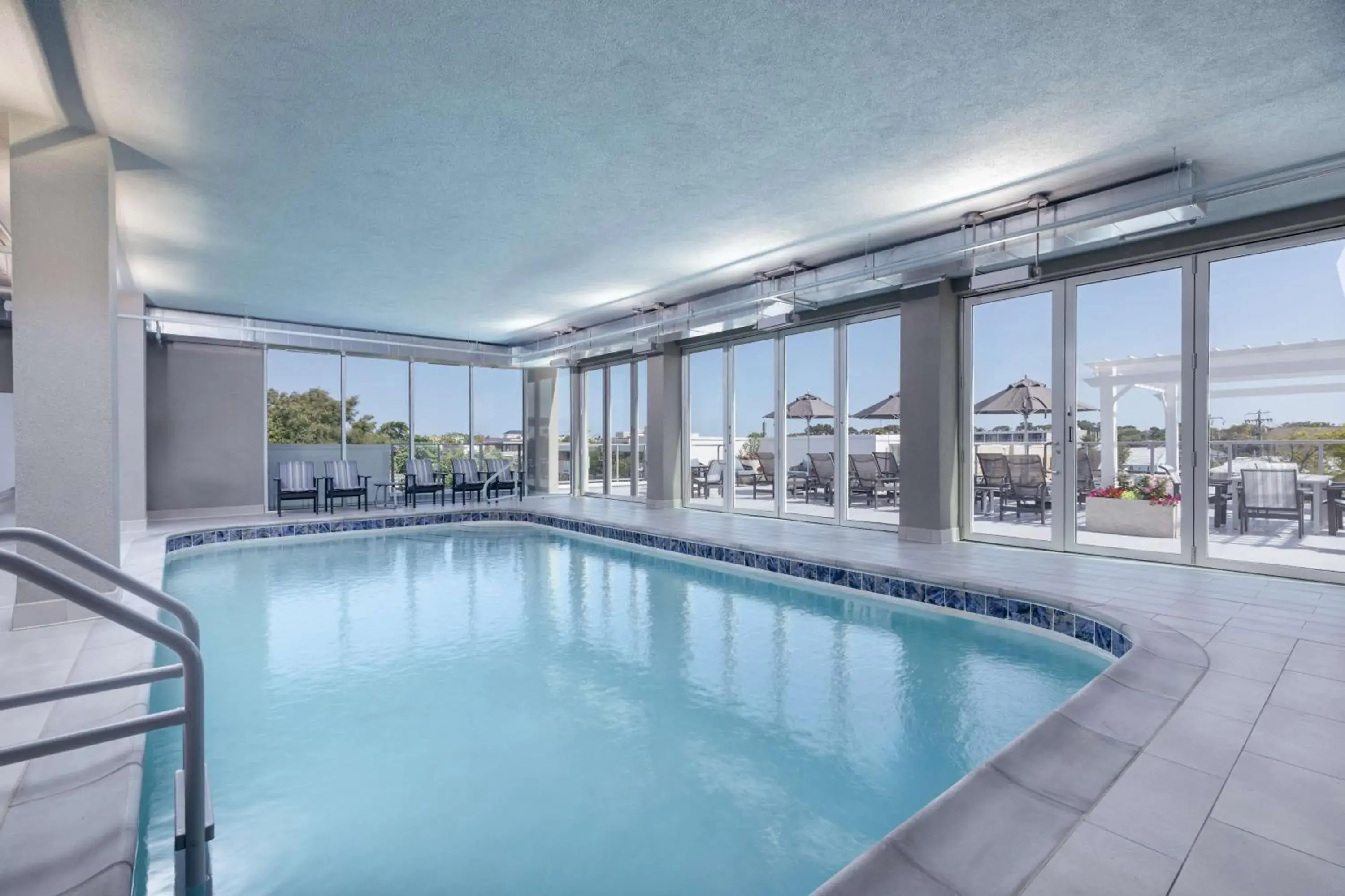 Pool view in Coast Rehoboth Beach, Tapestry Collection By Hilton Pool view in Coast Rehoboth Beach, Tapestry Collection By Hilton
