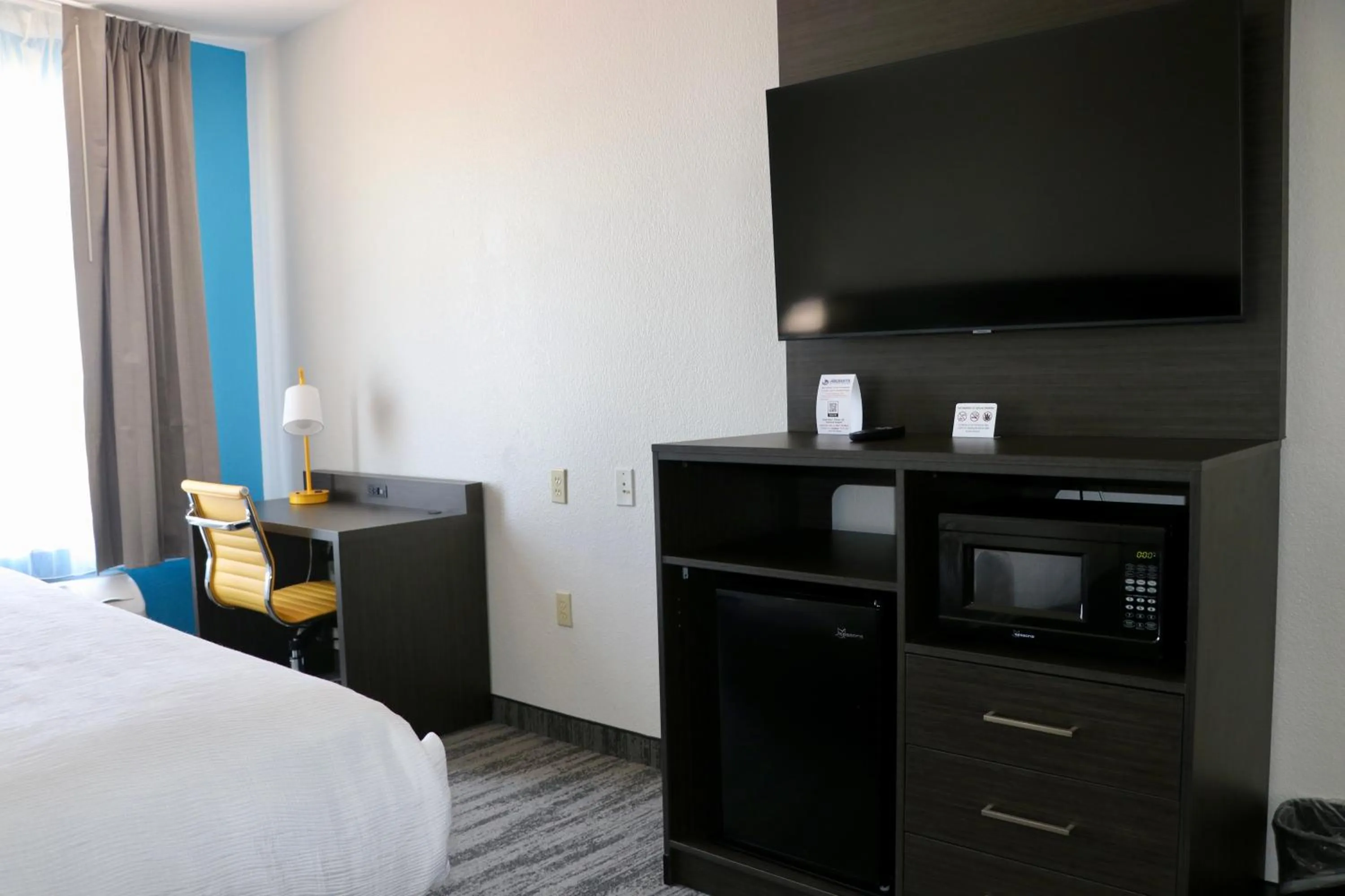 Bed in Quality Inn & Suites