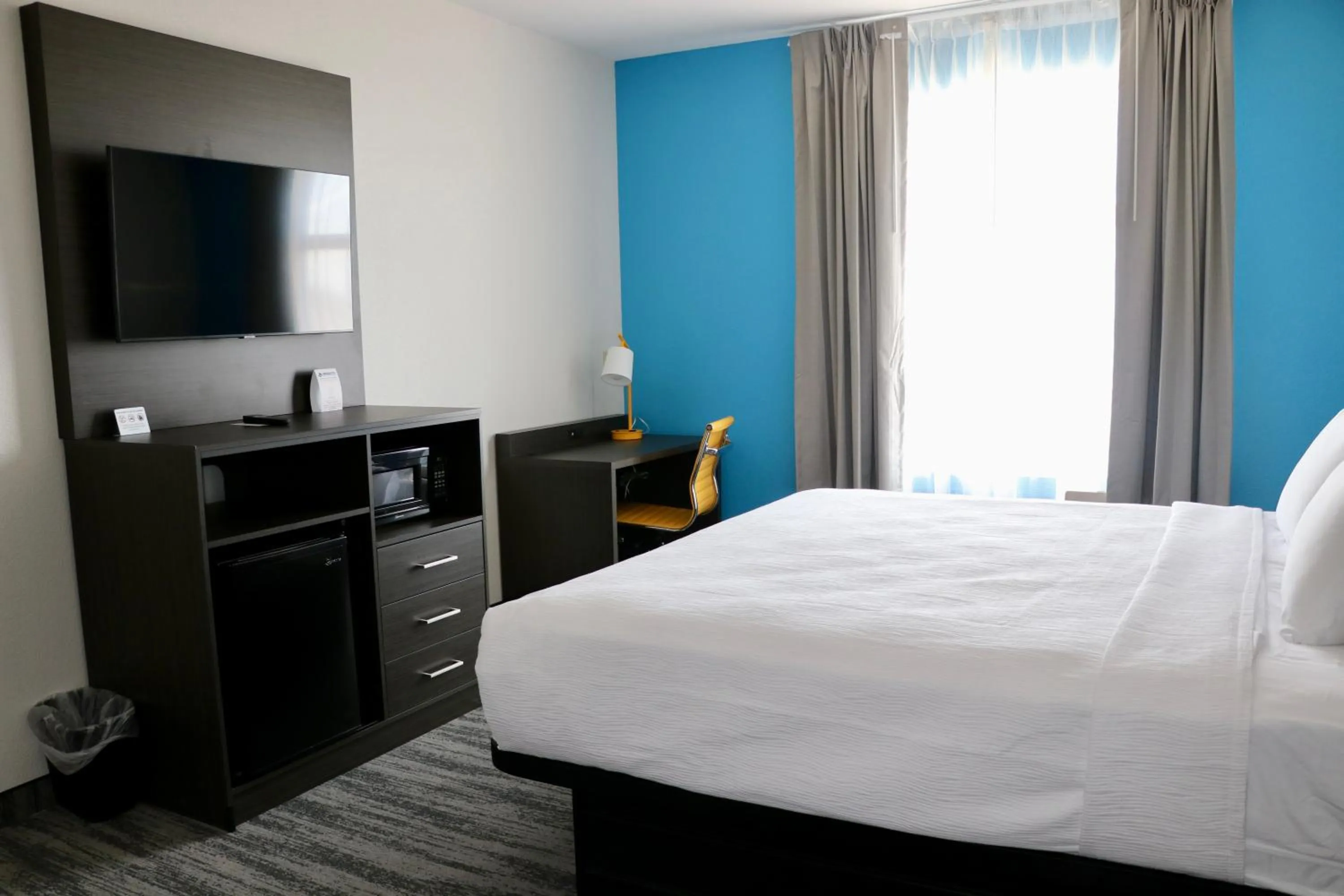 Bed in Quality Inn & Suites