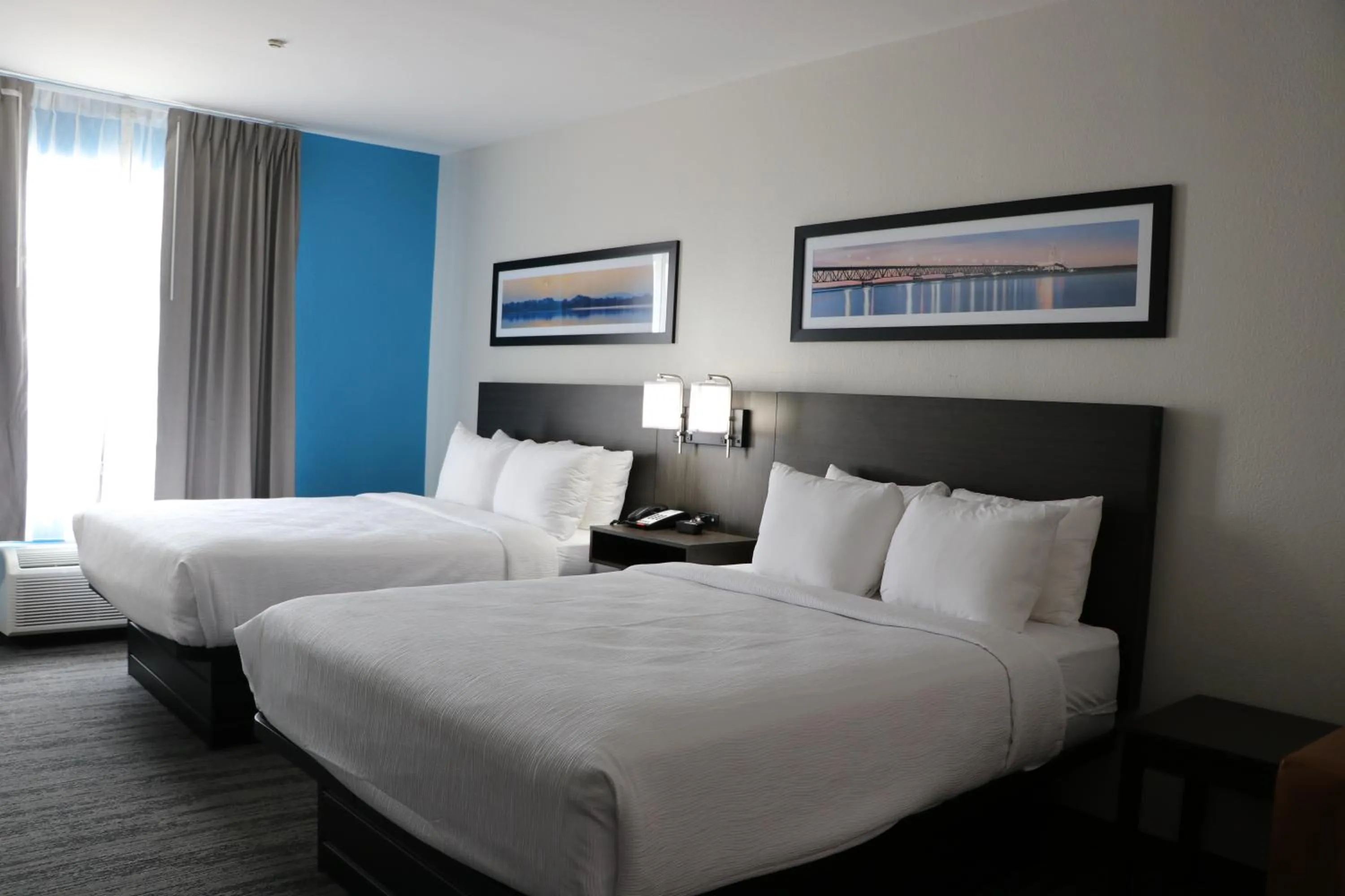 Bed in Quality Inn & Suites