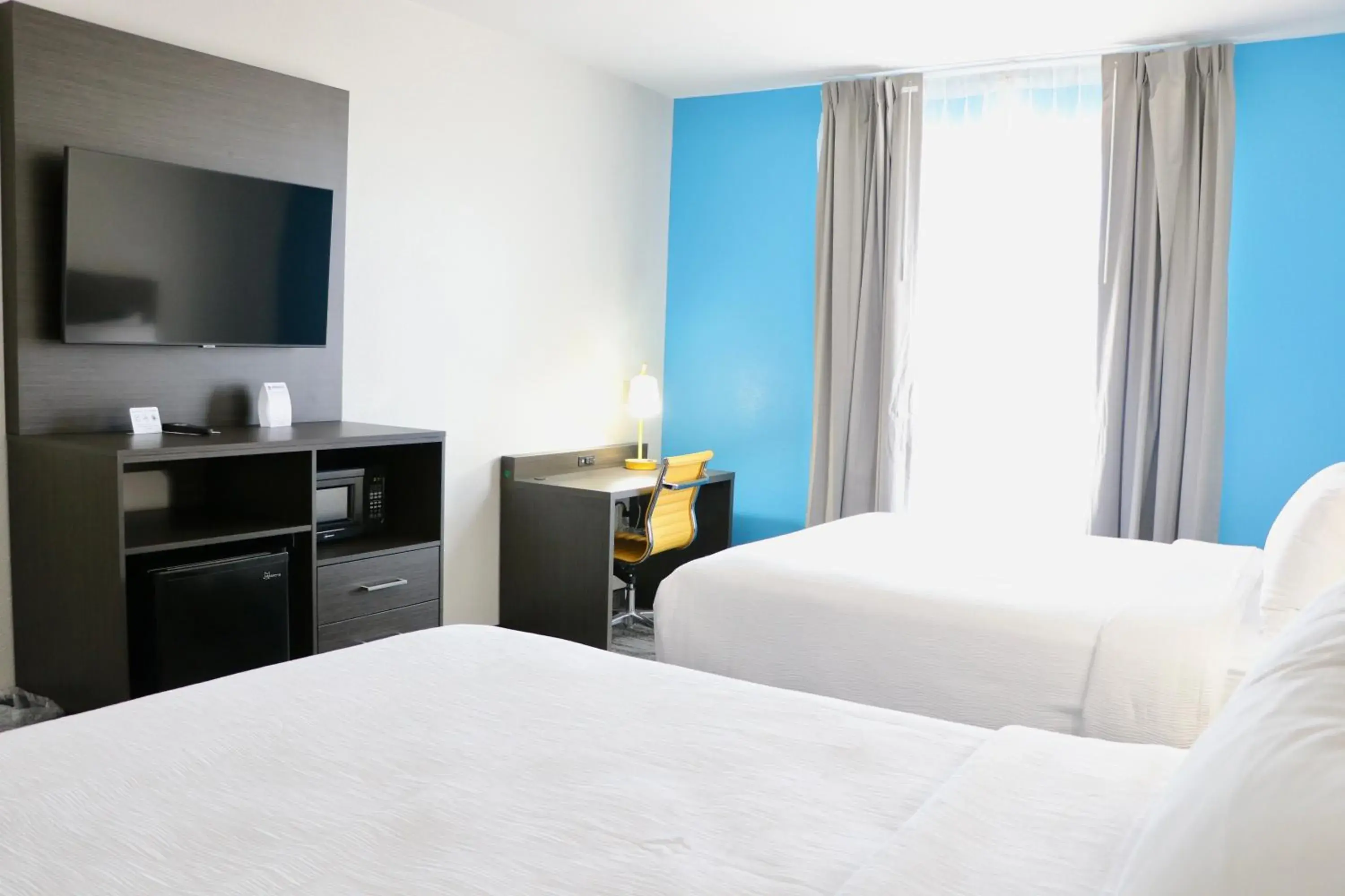 Bed in Quality Inn & Suites Bed in Quality Inn & Suites