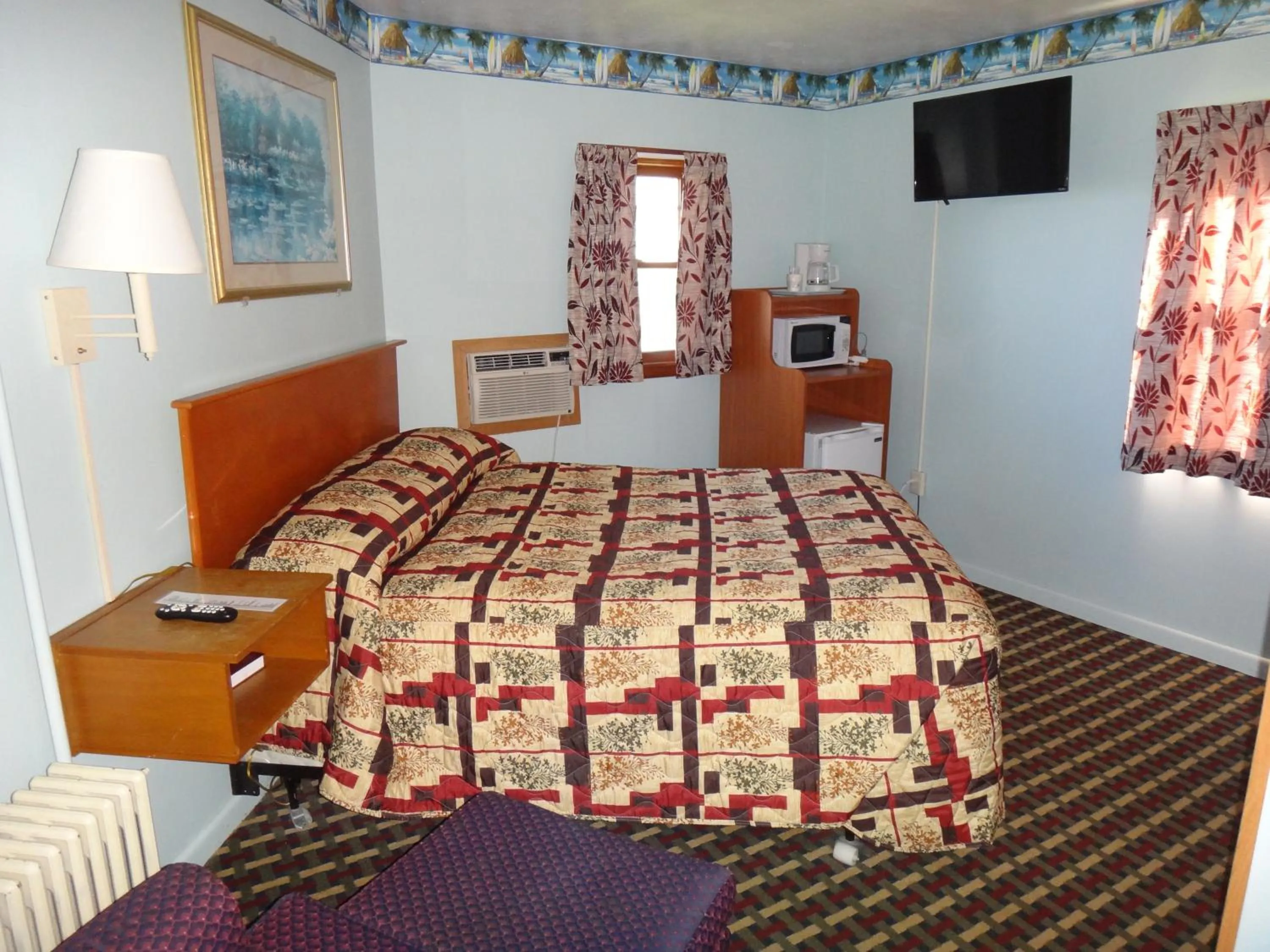 Bed in Pine Ridge Motel