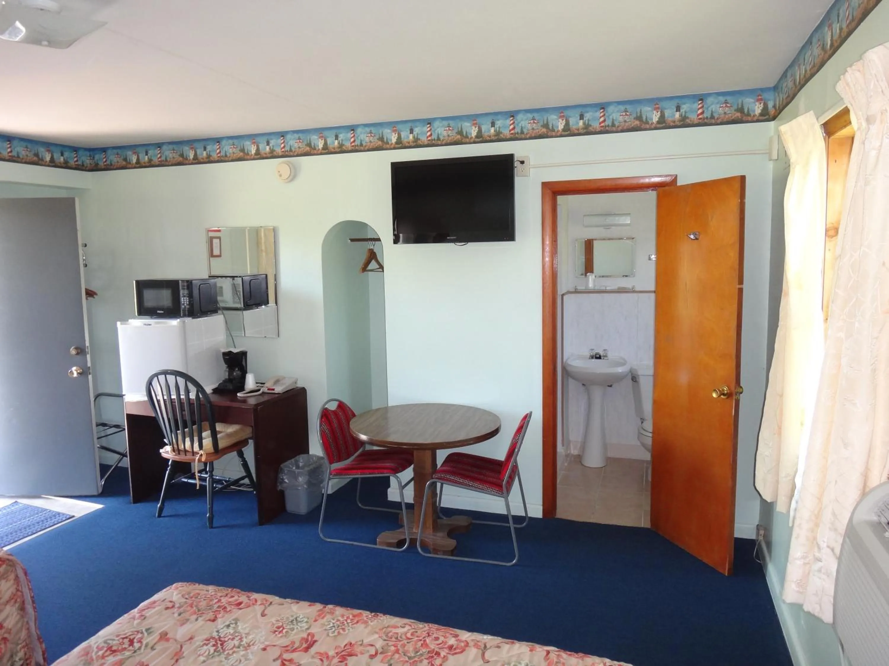 Bed in Pine Ridge Motel