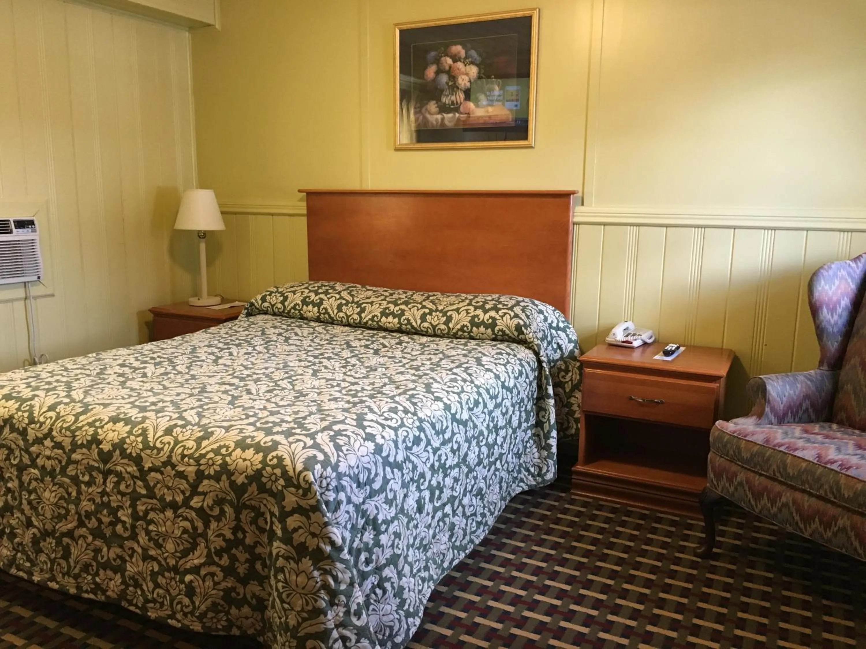 Bed in Pine Ridge Motel