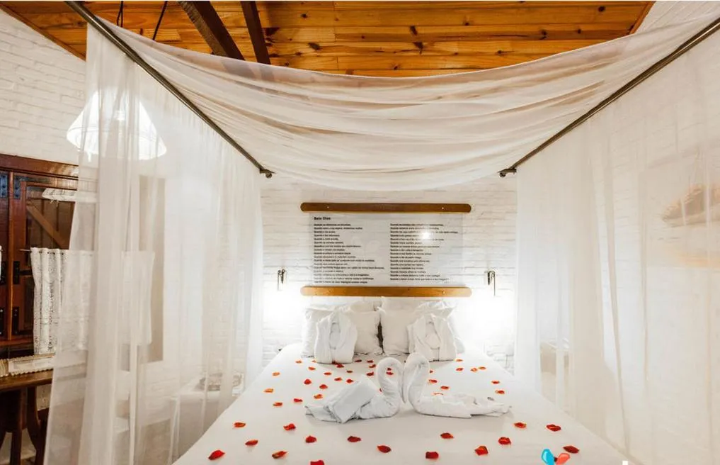 Photo of the whole room, Bed in Pousada Cantinho das Estrelas