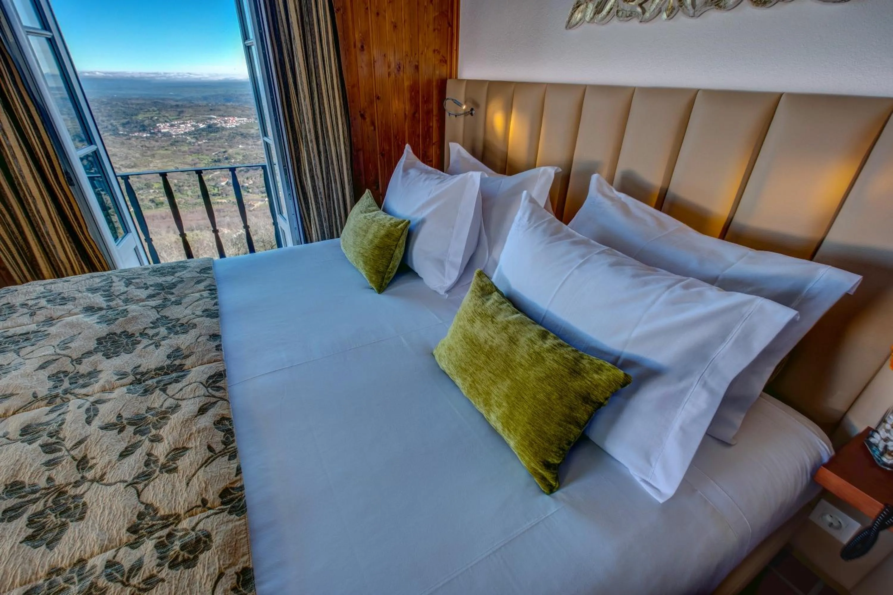 Bed in Hotel El Rei Dom Manuel