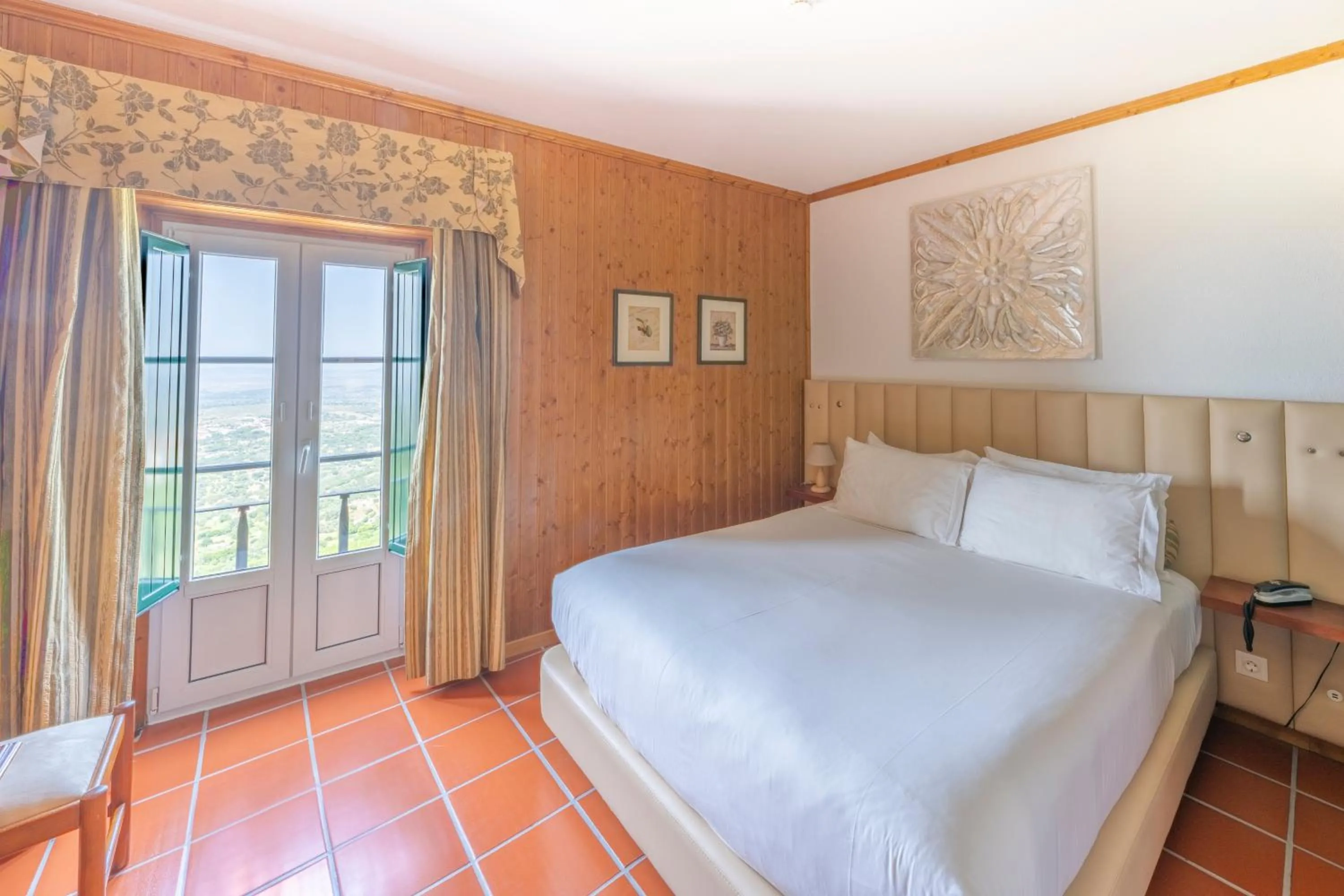 Bed in Hotel El Rei Dom Manuel