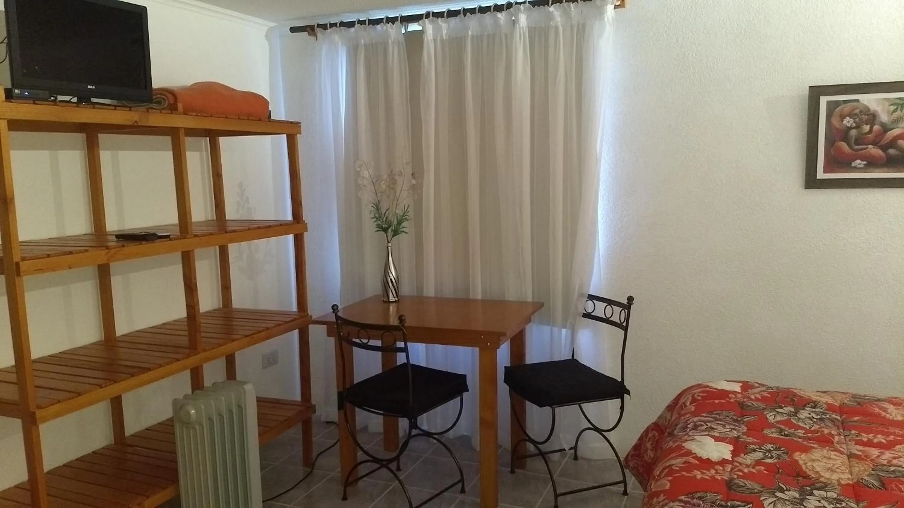 Photo of the whole room, Bed in Apart Hotel y Hosteria del Sir
