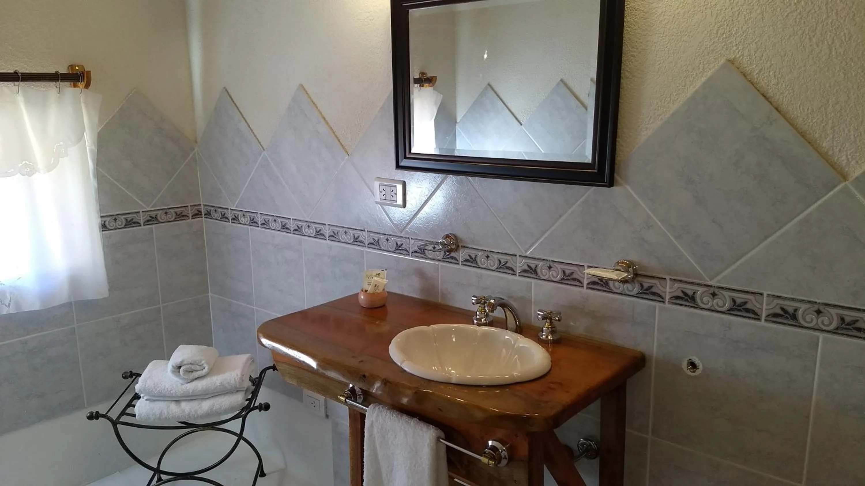 Bathroom in Apart Hotel y Hosteria del Sir