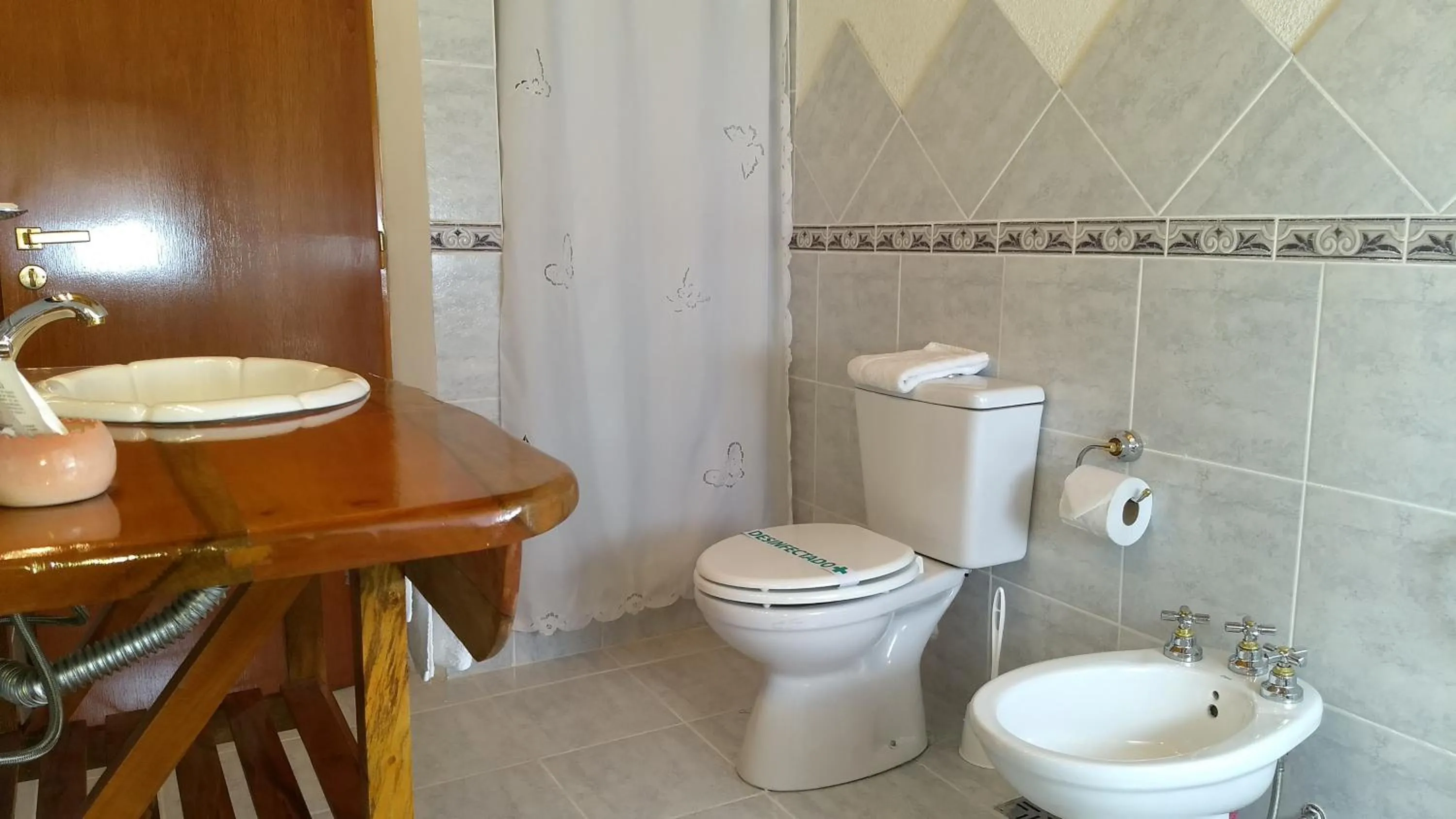 Bathroom in Apart Hotel y Hosteria del Sir