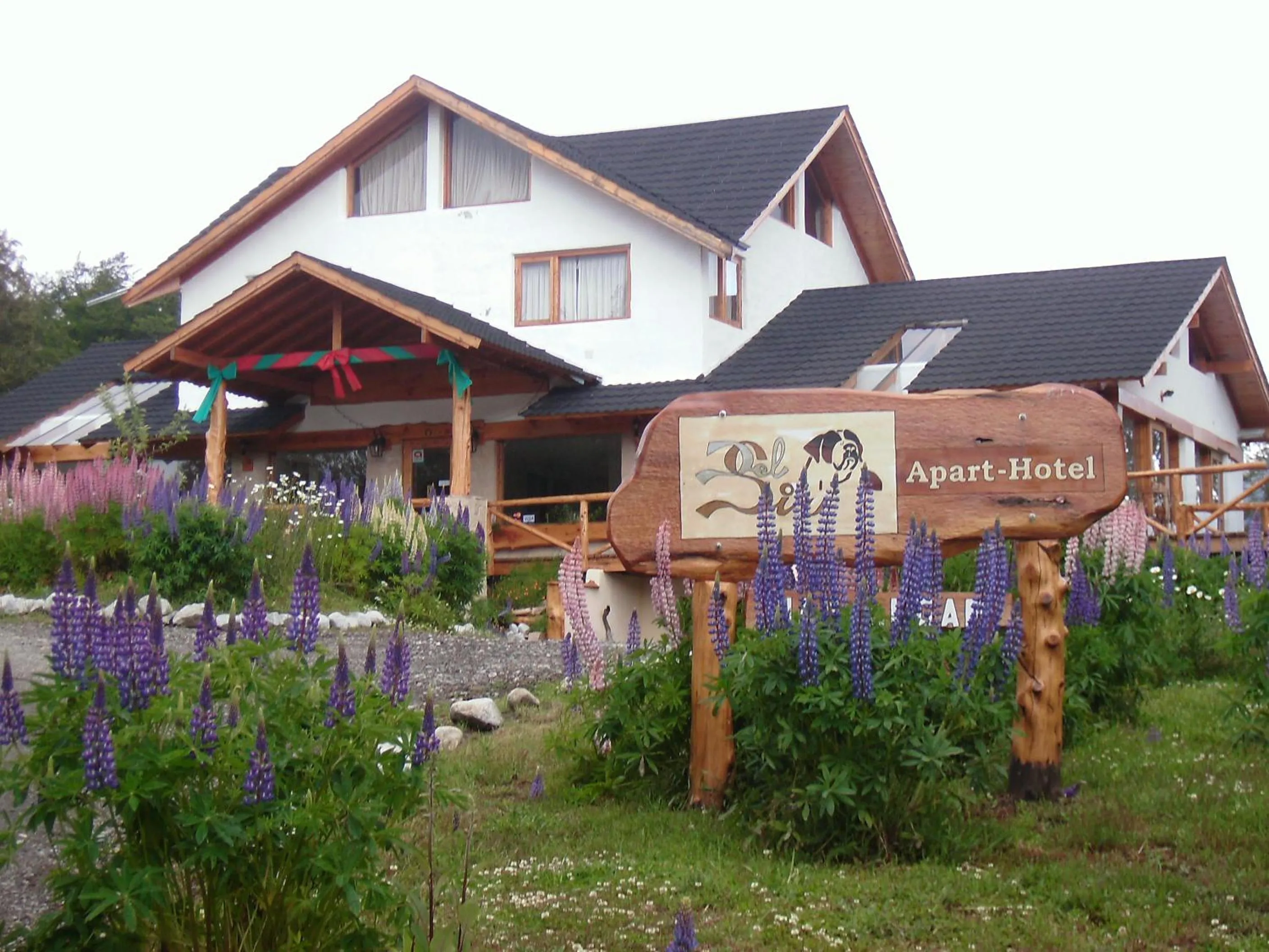 Property logo or sign in Apart Hotel y Hosteria del Sir