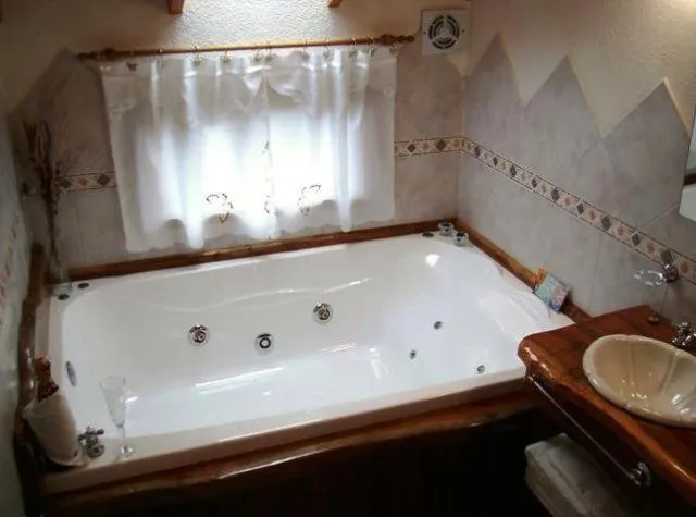 Bathroom in Apart Hotel y Hosteria del Sir