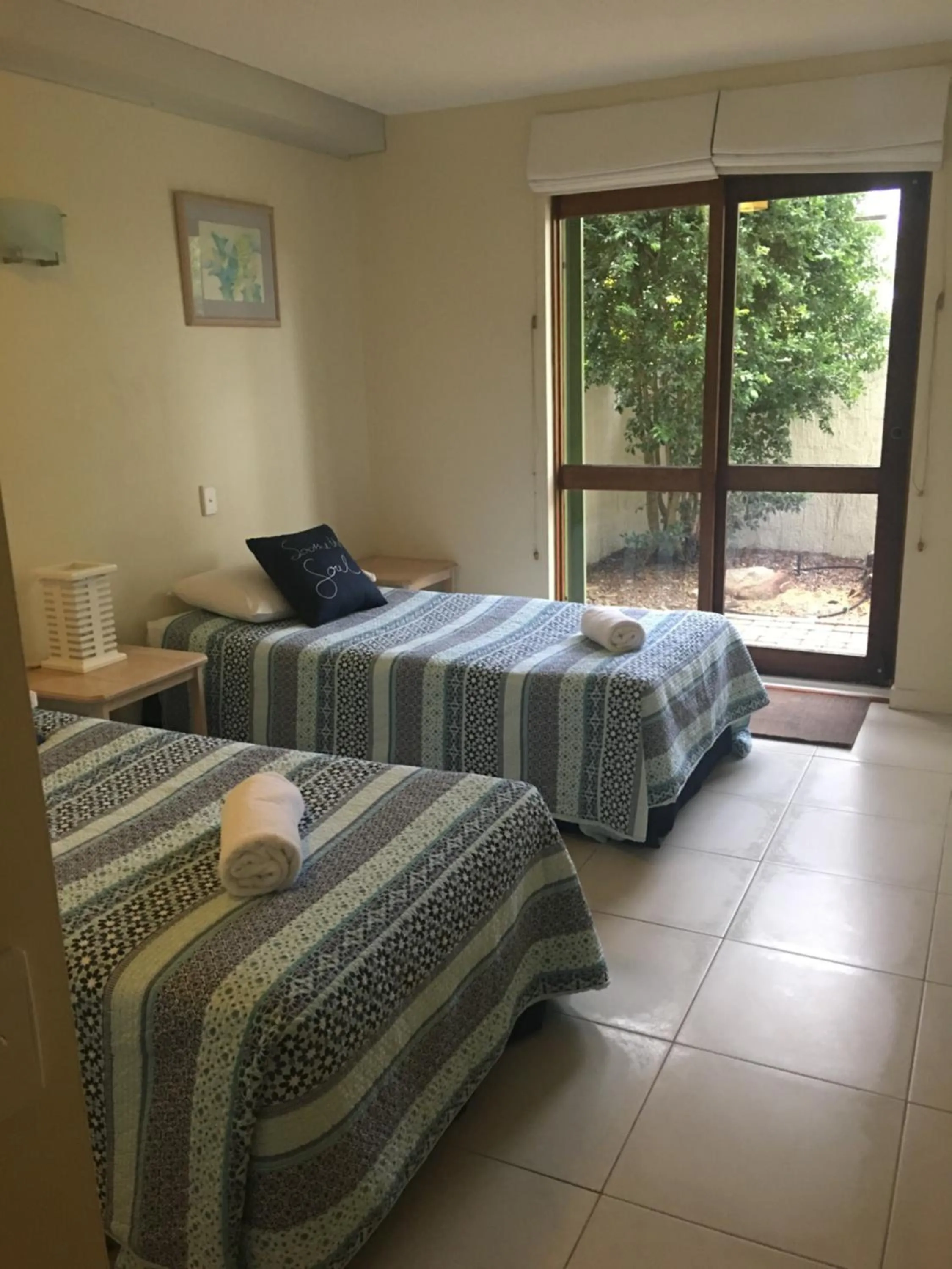 Bed in Camargue Beachfront Apartments