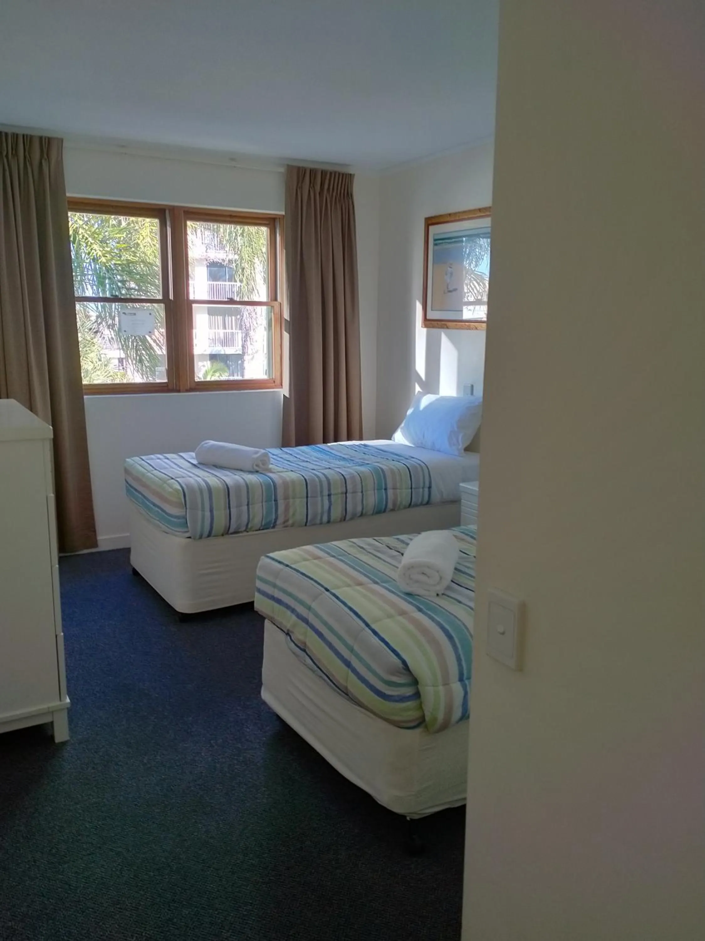 Bed in Camargue Beachfront Apartments