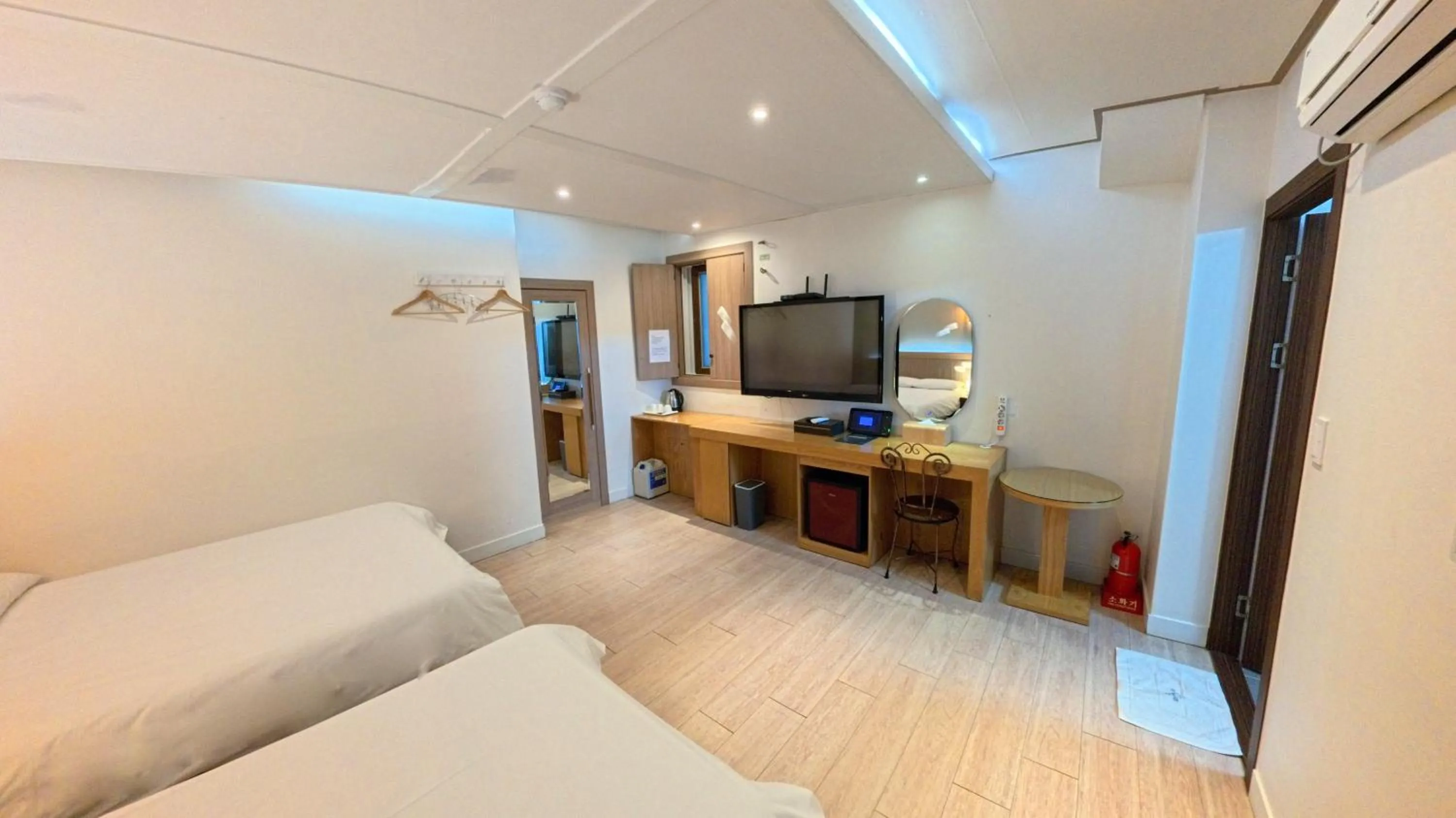 Bed in Friendly DH Naissance Hotel by Mindrum Group